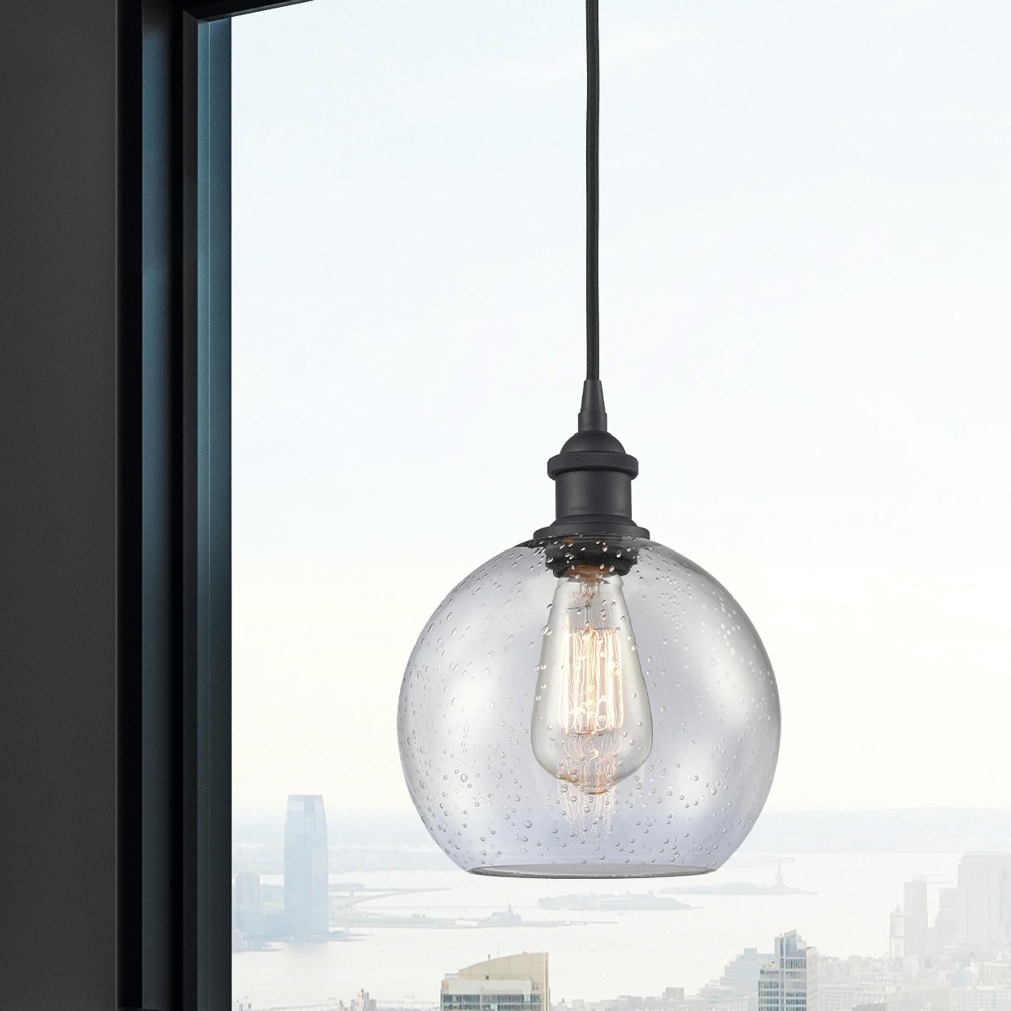 Shown in Matte Black finish and Seedy glass