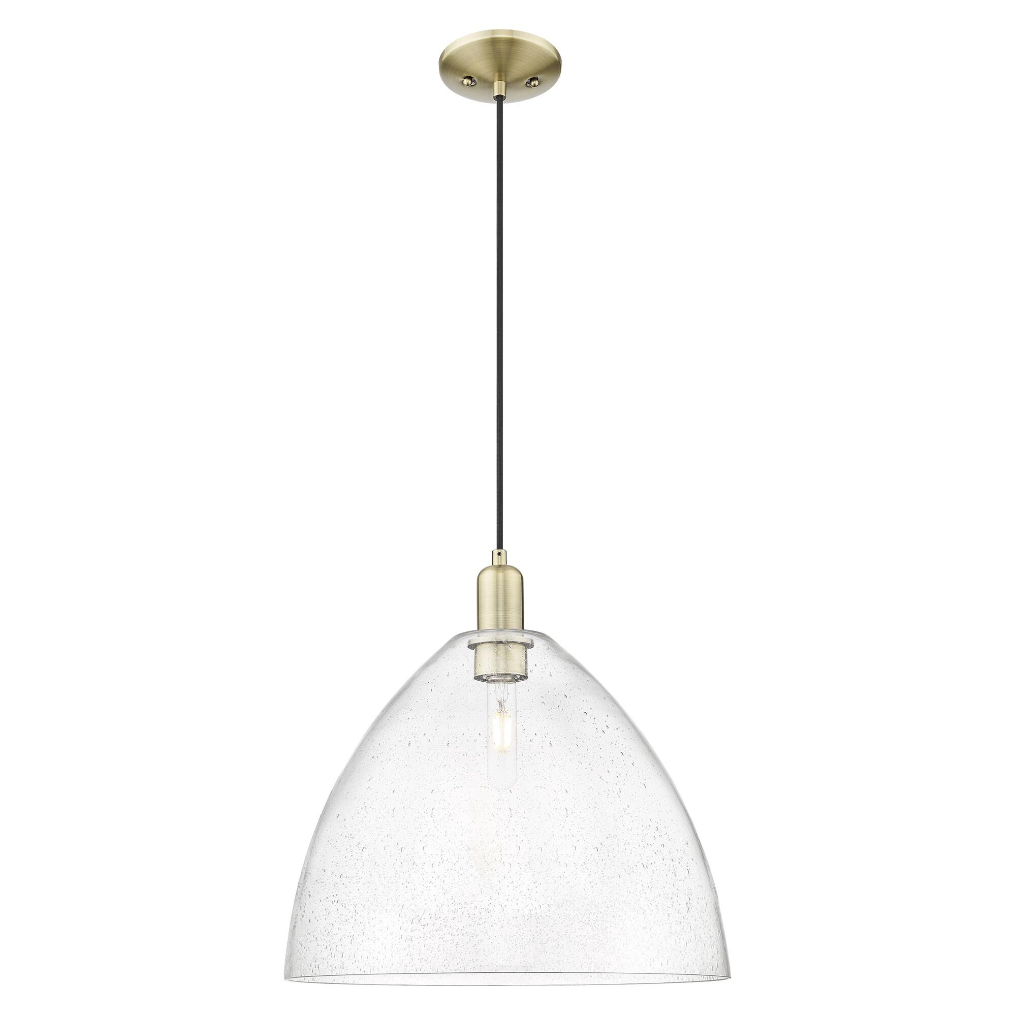 Shown in Antique Brass finish and Seedy glass