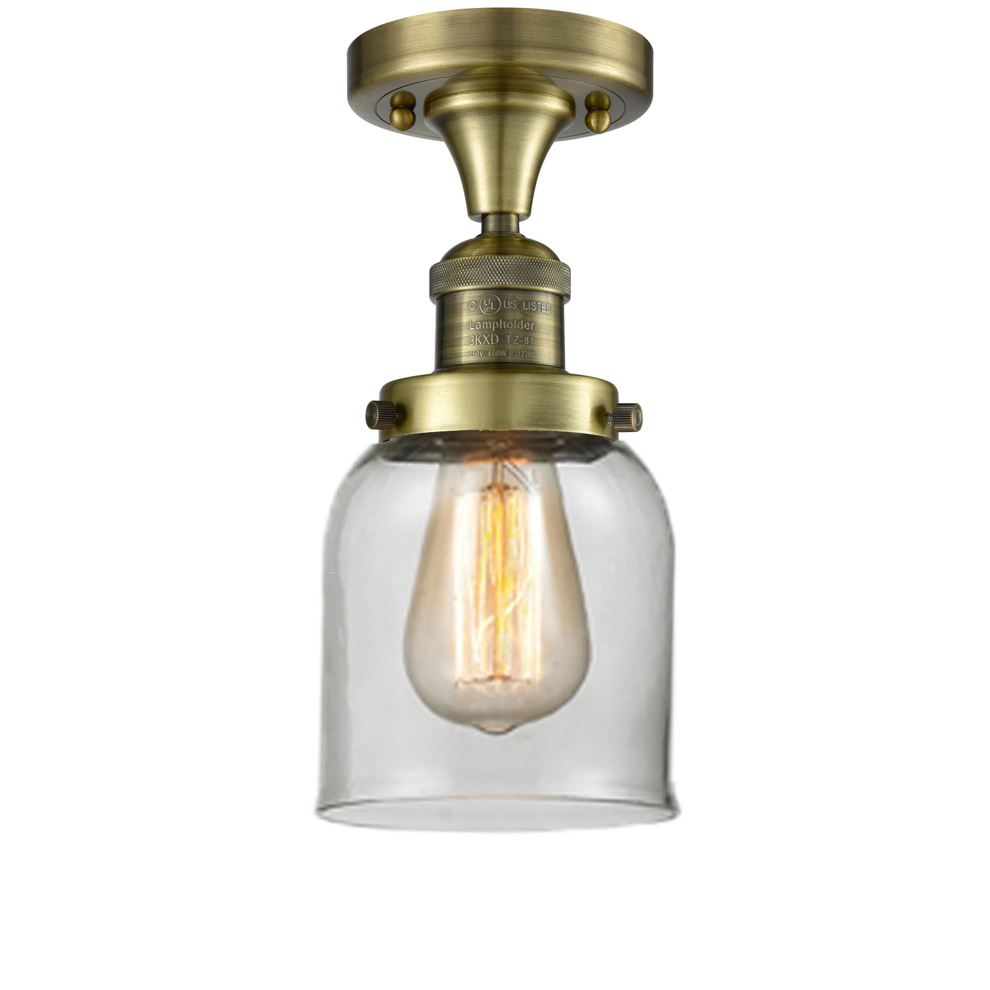 Shown in Antique Brass finish and Clear glass