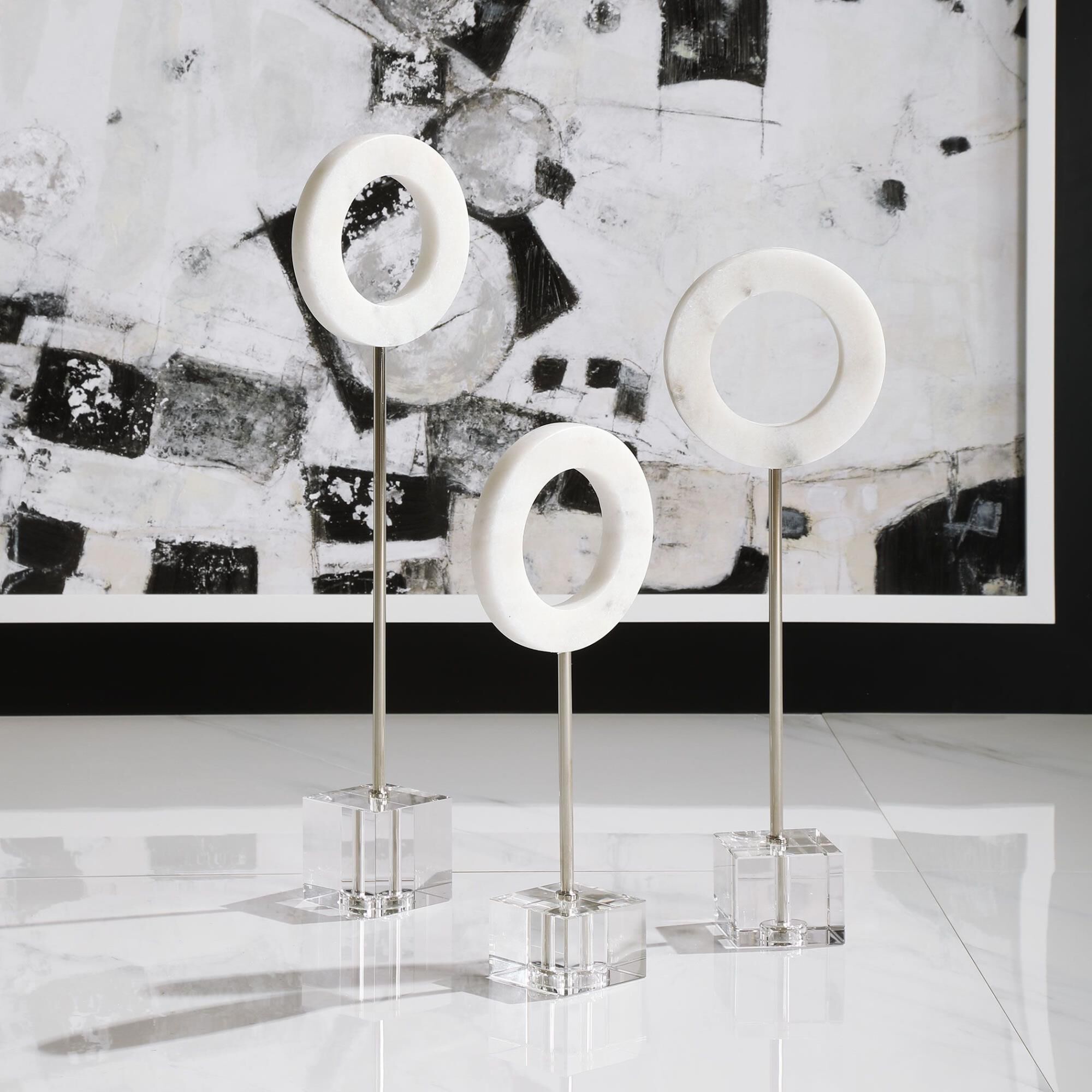 Shown in Contemporary Trio Features Solid White Marble Rings Supported By Polished Chrome Rods And An Elegant finish