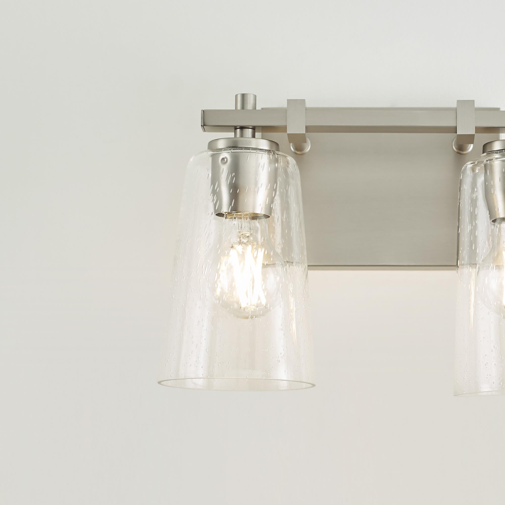 Shown in Satin Nickel finish and Clear Seeded glass