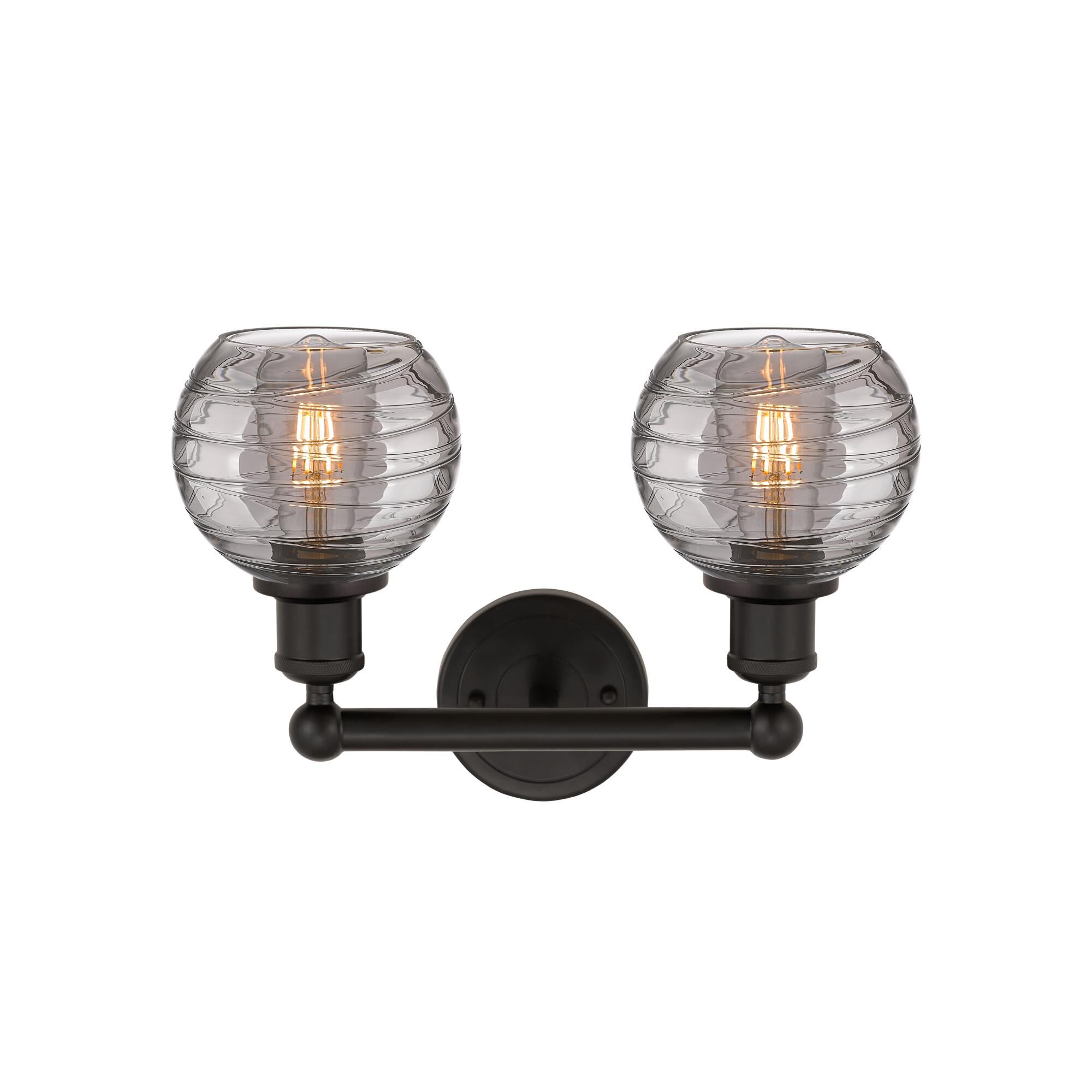 Shown in Oil Rubbed Bronze finish and Light Smoke Deco Swirl glass