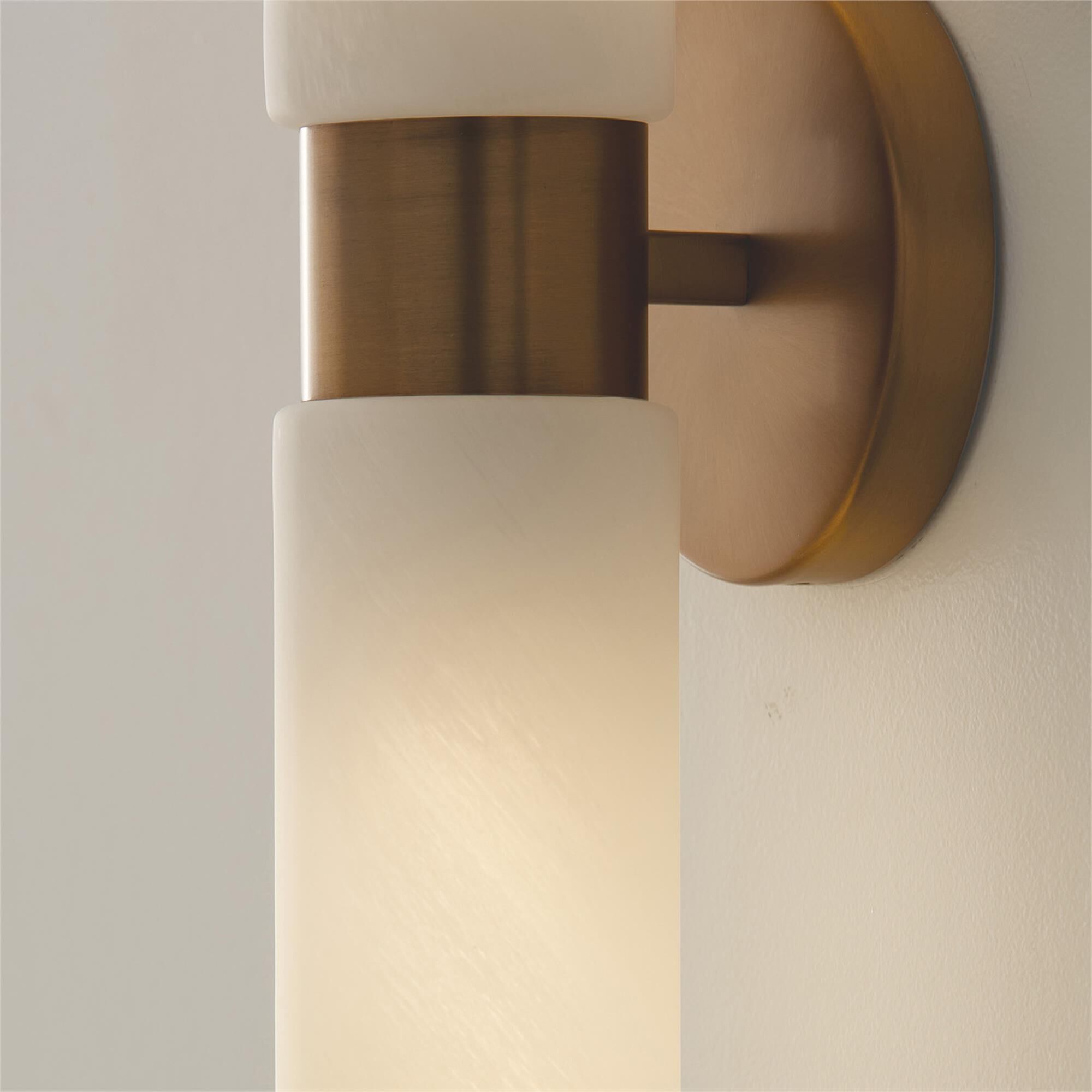 Shown in Aged Brass finish and Faux Alabaster glass