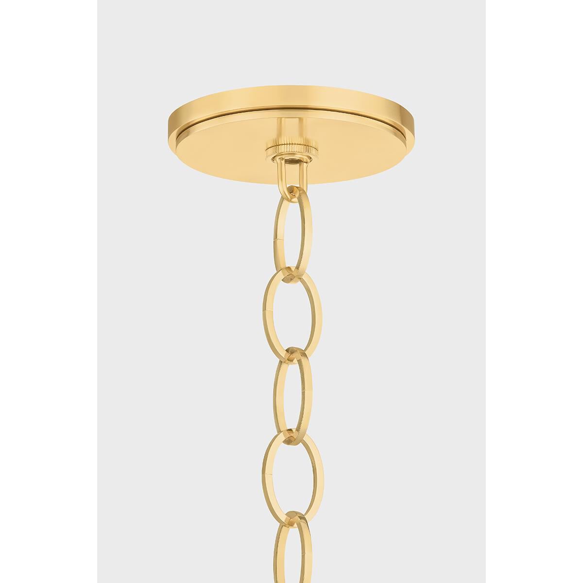 Shown in Aged Brass finish and Clear Cloud Seeded glass