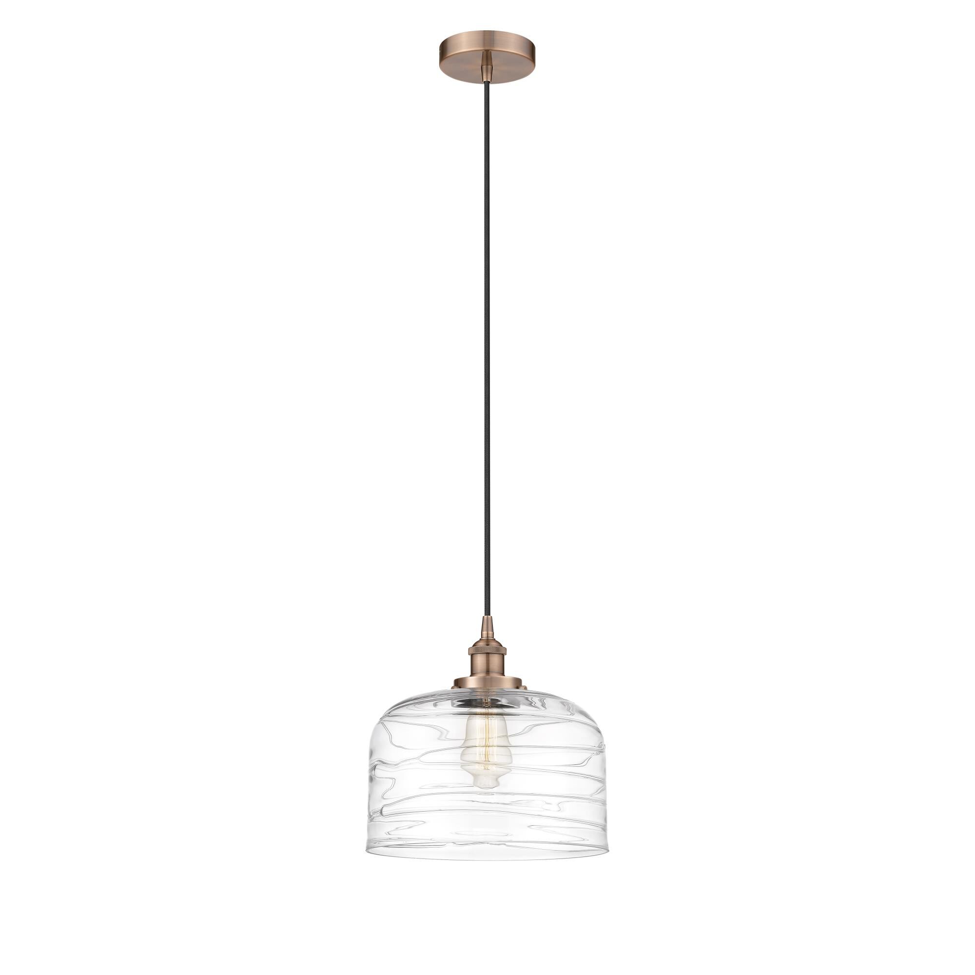 Shown in Antique Copper finish and Deco Swirl glass