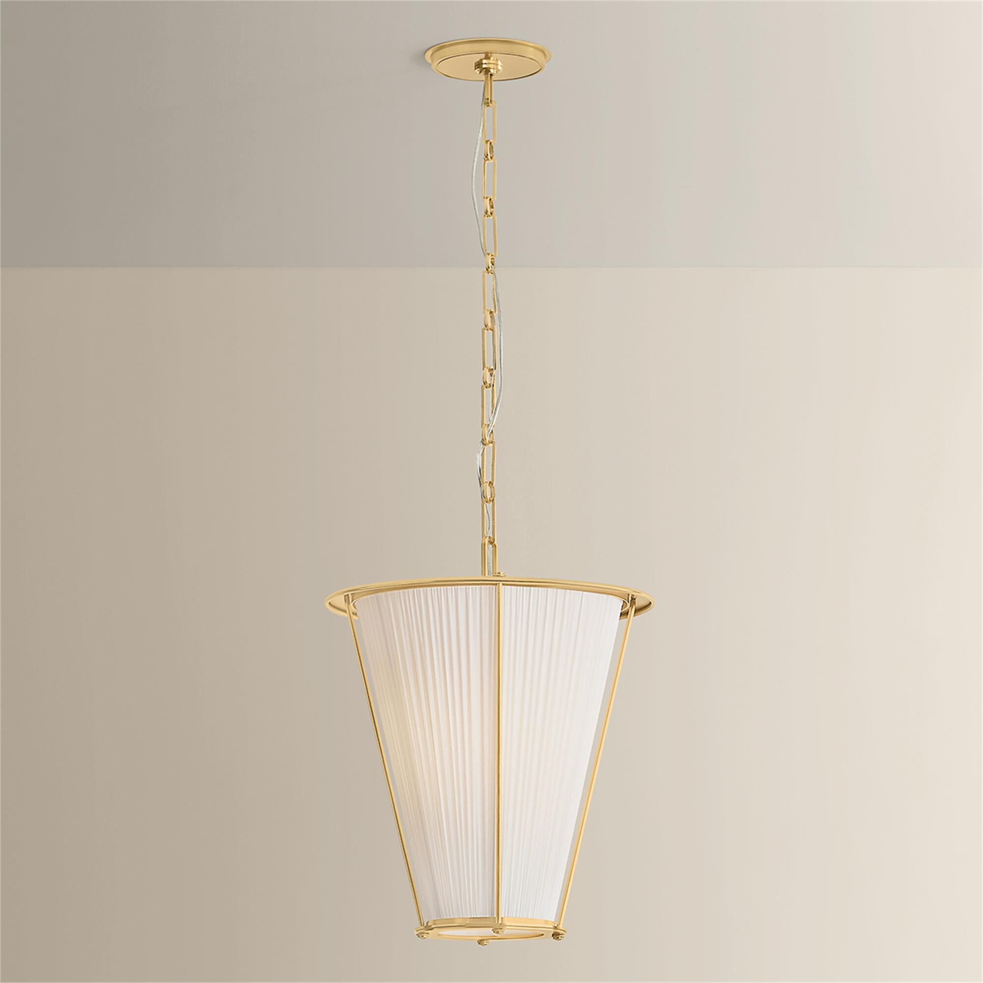 Shown in Aged Brass finish and Ivory Silk shade