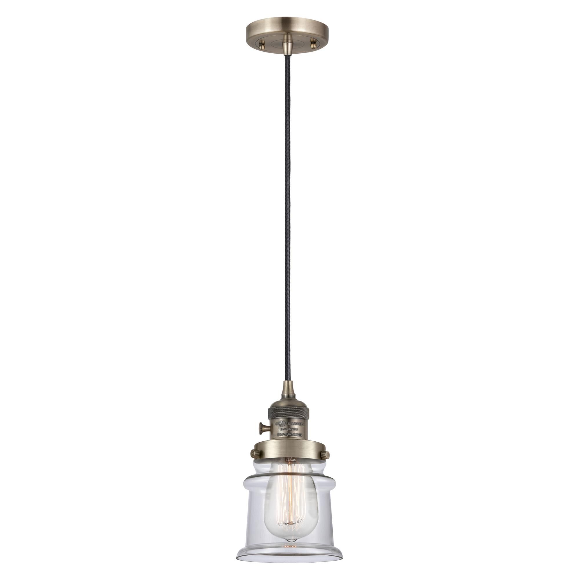 Shown in Antique Brass finish and Clear glass