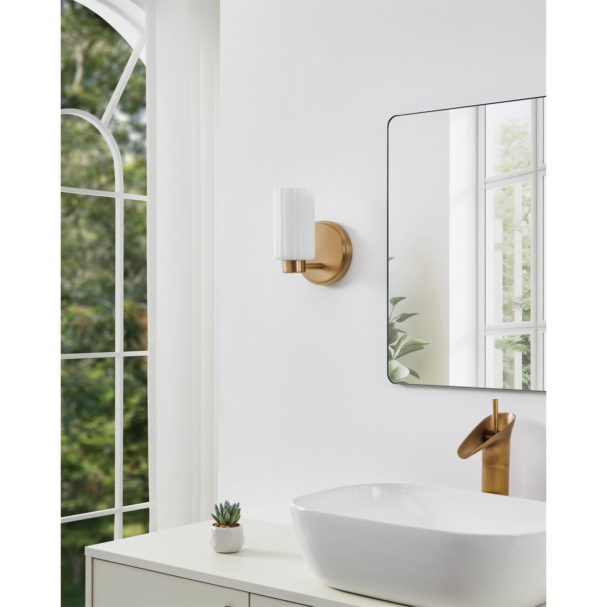 Shown in Champagne Gold finish and Etched Opal Ribbed glass