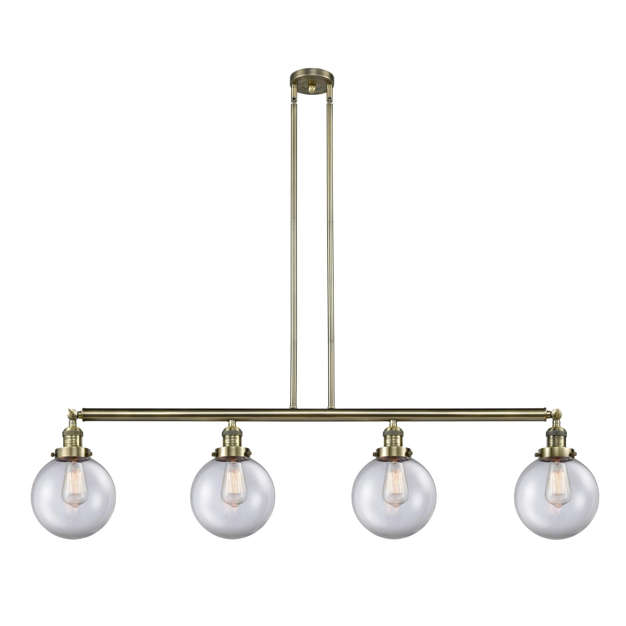 Shown in Antique Brass finish and Clear Beacon glass and None shade