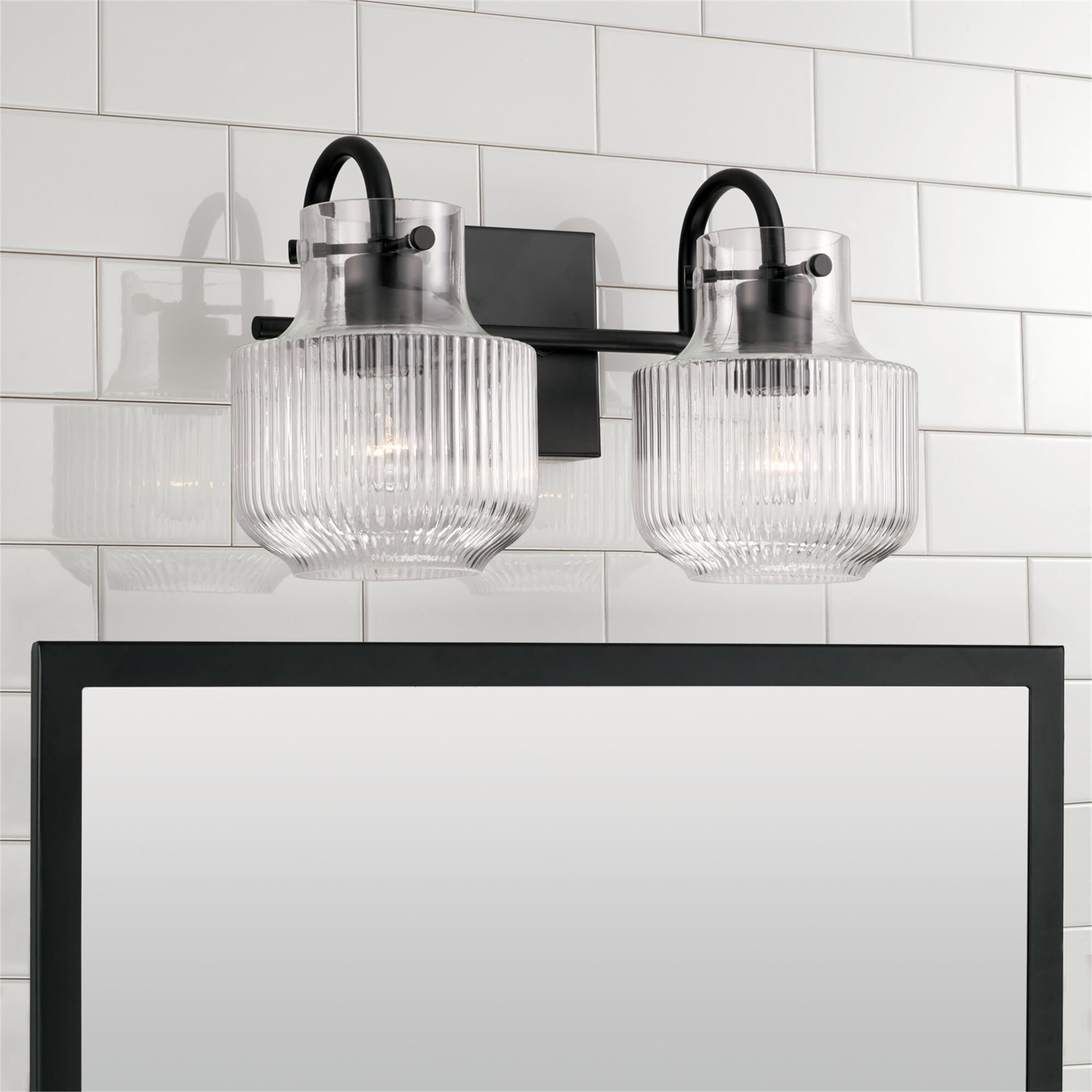 Shown in Matte Black finish and Clear Fluted glass