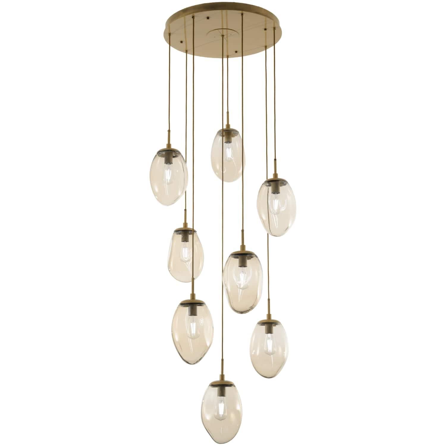 Shown in Gilded Brass finish and Blown Amber glass