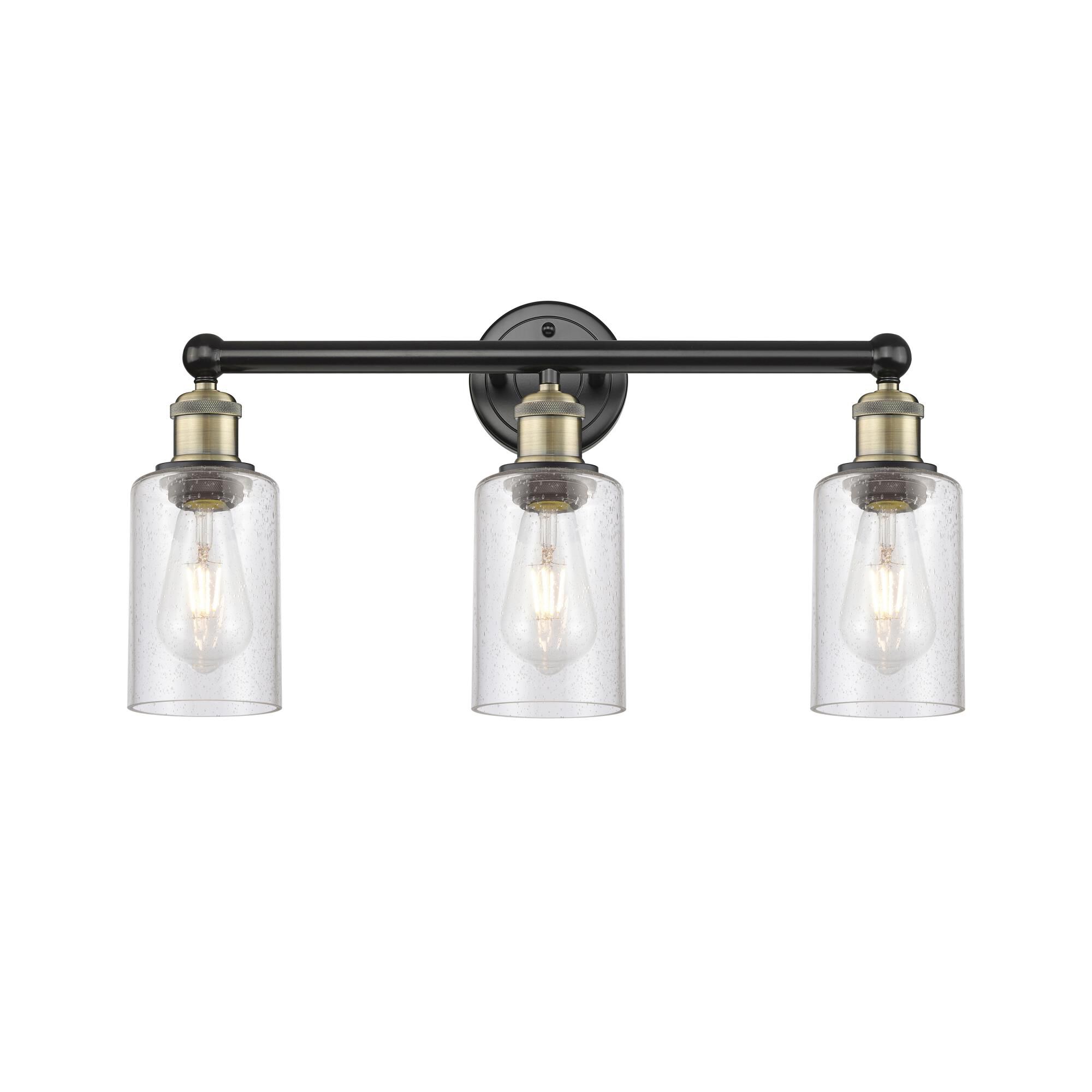 Shown in Black Antique Brass finish and Seedy glass