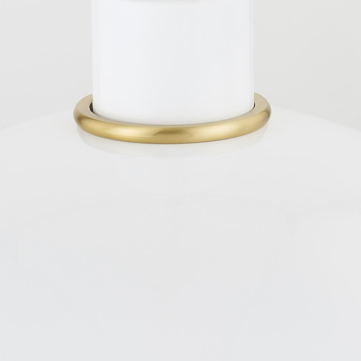 Shown in Aged Brass and Glossy White finish and Metal shade