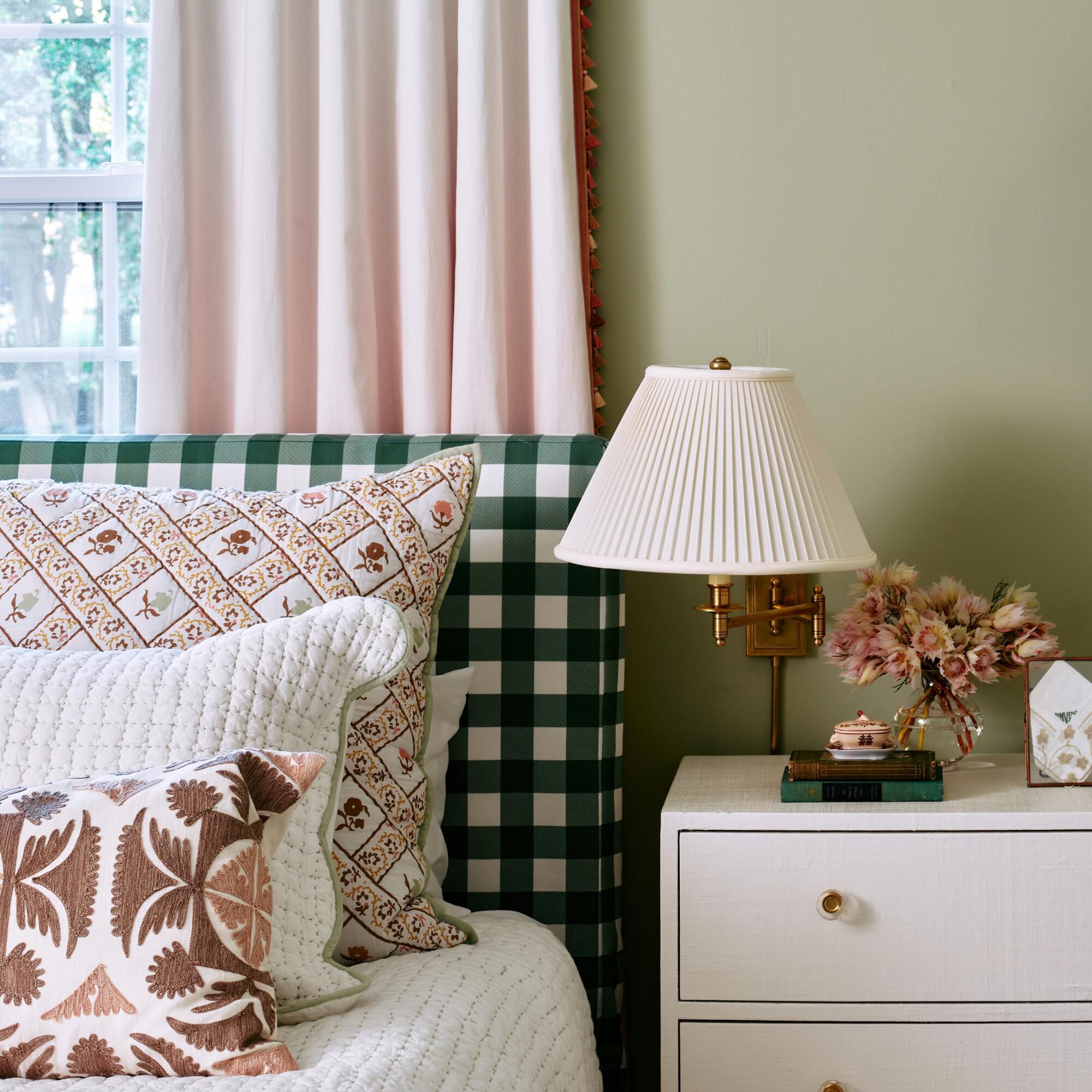 Shown in Antique Brass finish and Natural Side Pleat Fabric shade