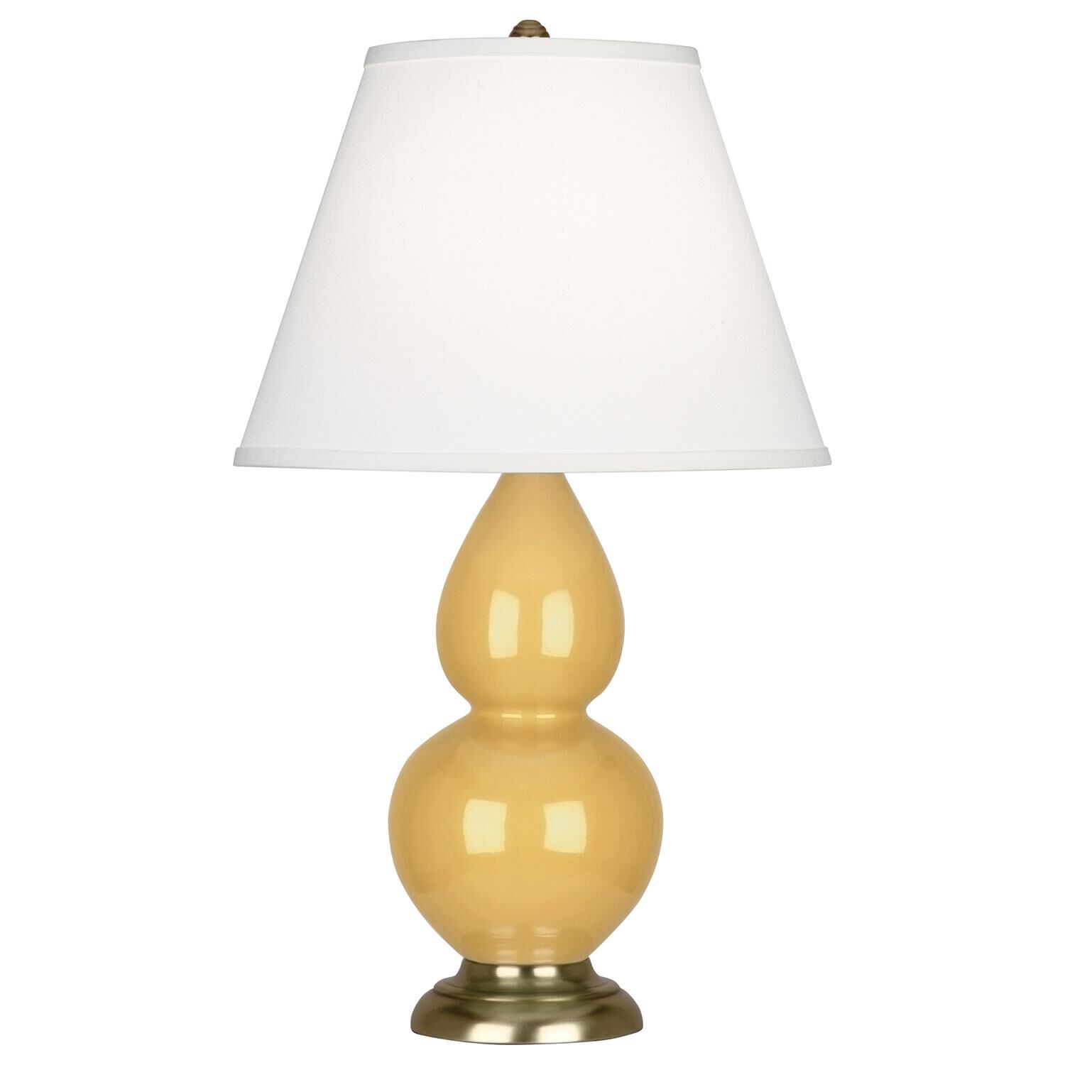 Shown in Sunset Yellow Glazed Ceramic With Antique Brass ed Accents finish and Pearl Dupioni Fabric shade
