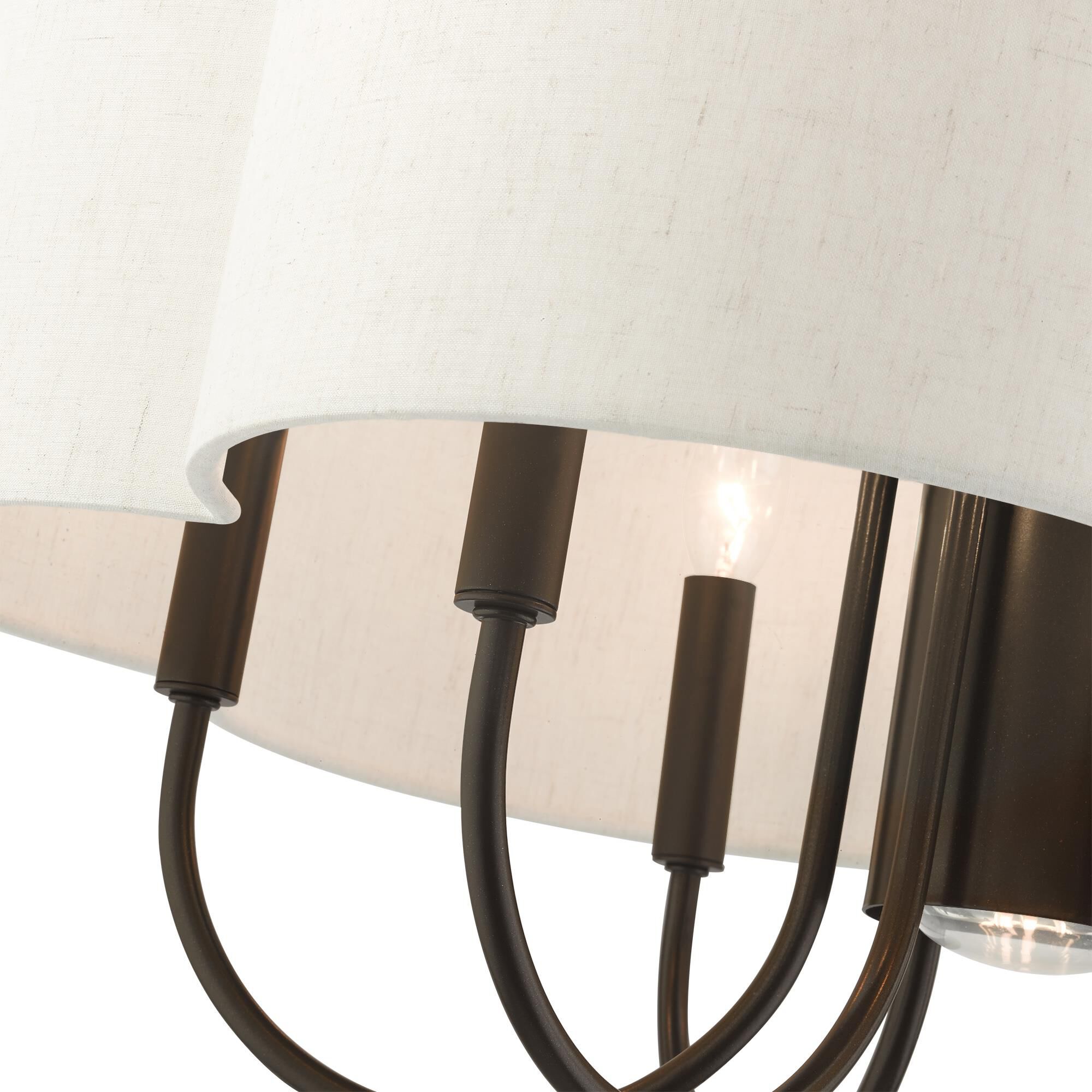 Shown in English Bronze finish and Hand Crafted Hardback Scalloped  Completely Finished With Oatmeal Color Fabric Outside and Inside shade