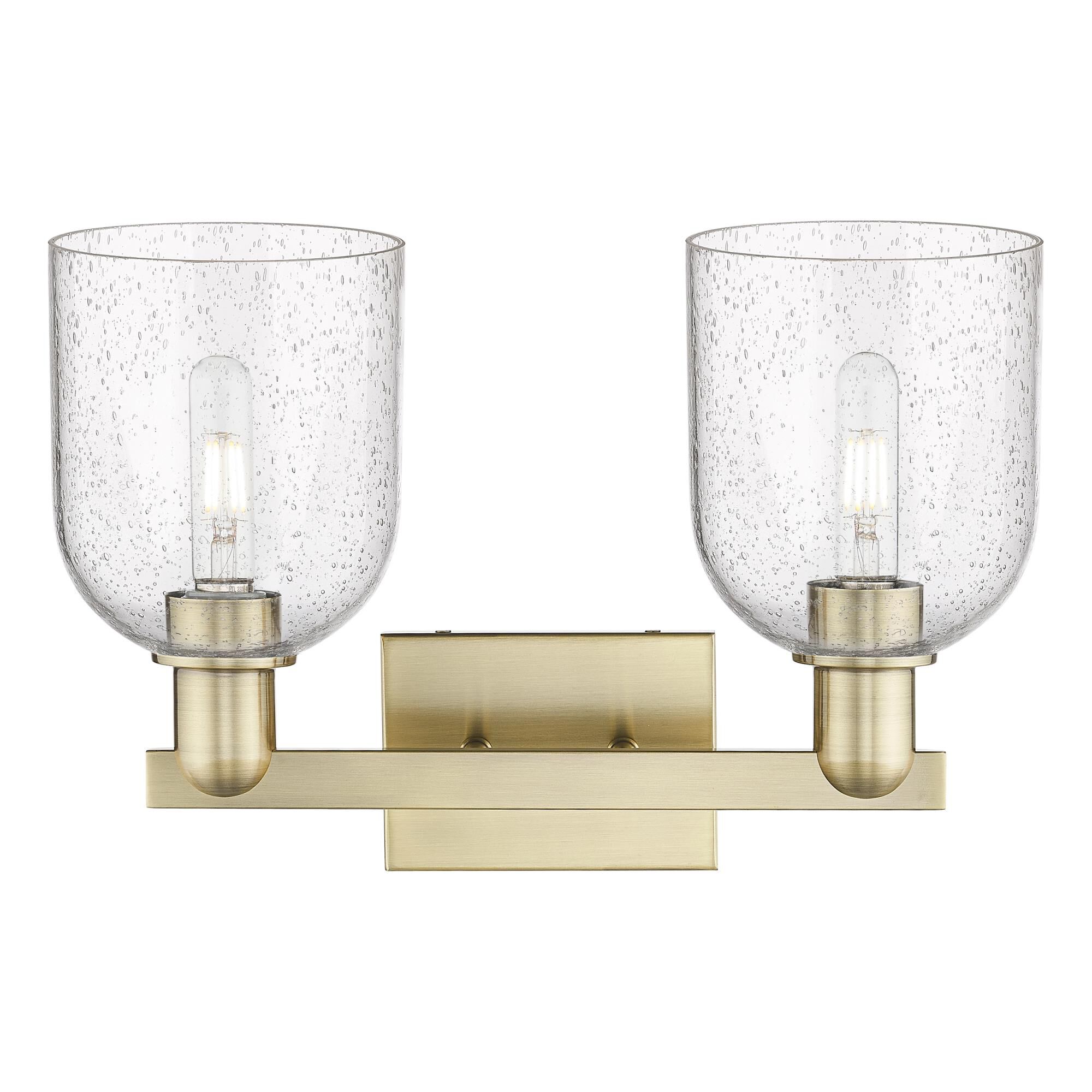 Shown in Antique Brass finish and Seedy glass