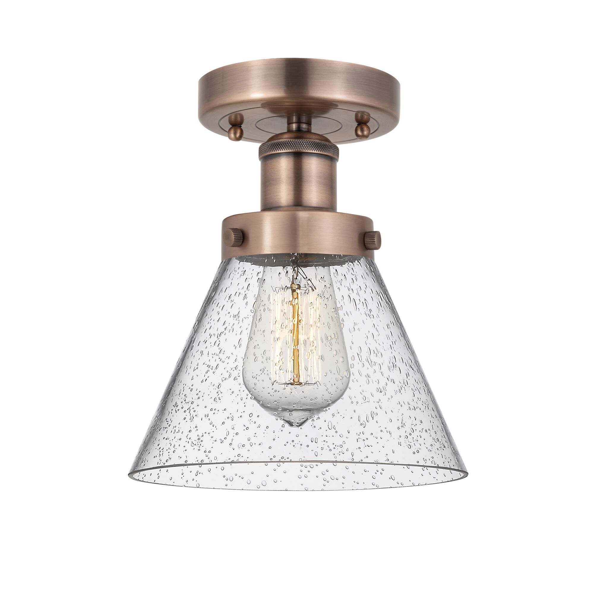 Shown in Antique Copper finish and Seedy glass