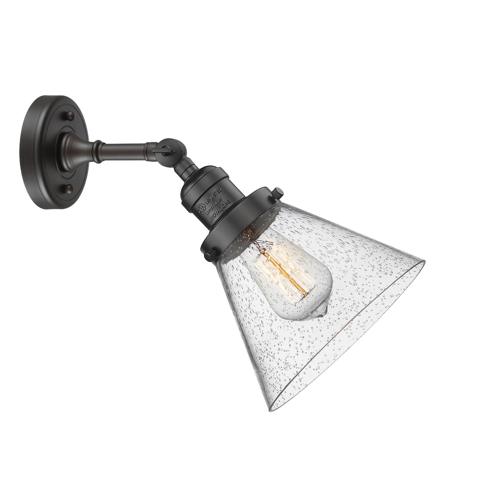 Shown in Oil Rubbed Bronze finish and Seedy glass and None accent