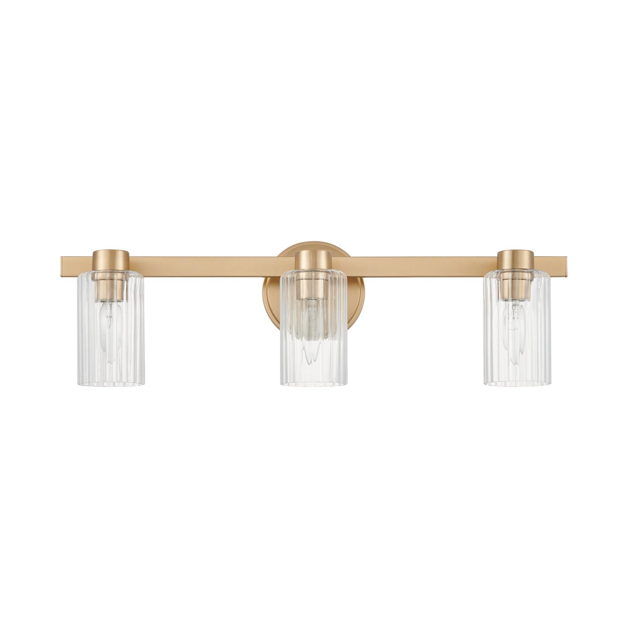 Shown in Champagne Gold finish and Clear Ribbed glass