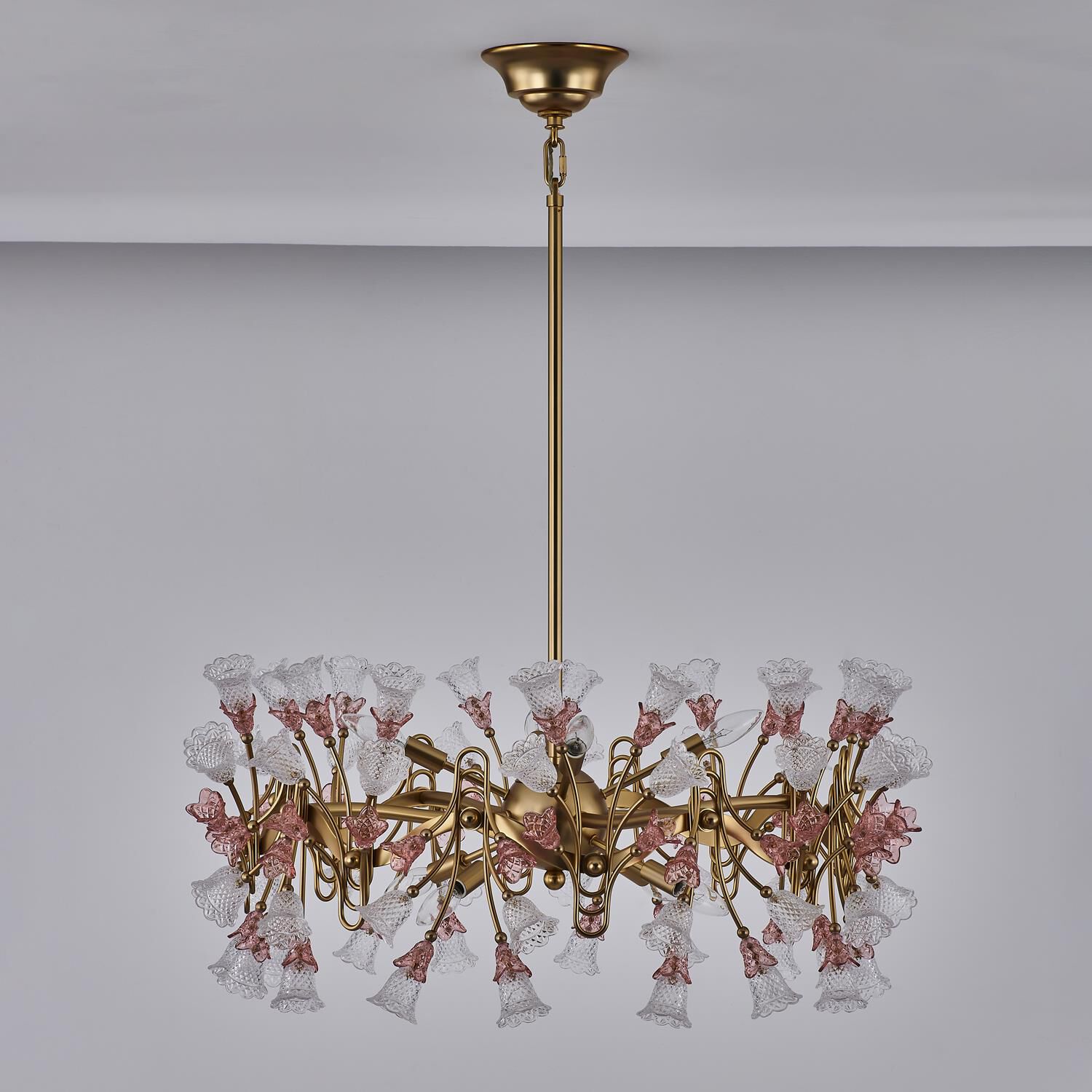 Shown in Antique Brass finish and Vintage Rose crystal