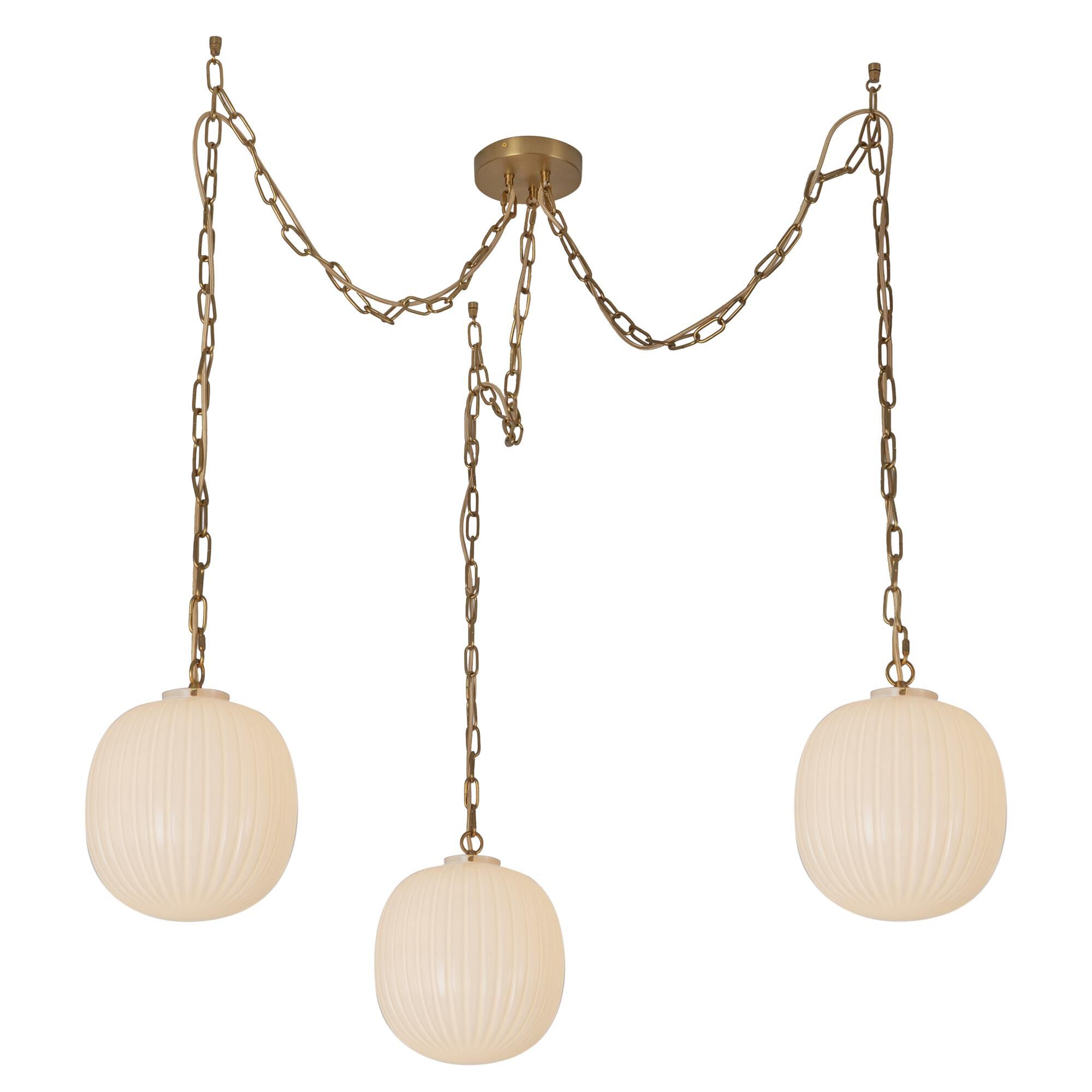 Shown in Brushed Gold finish and Glossy Ribbed Opal glass
