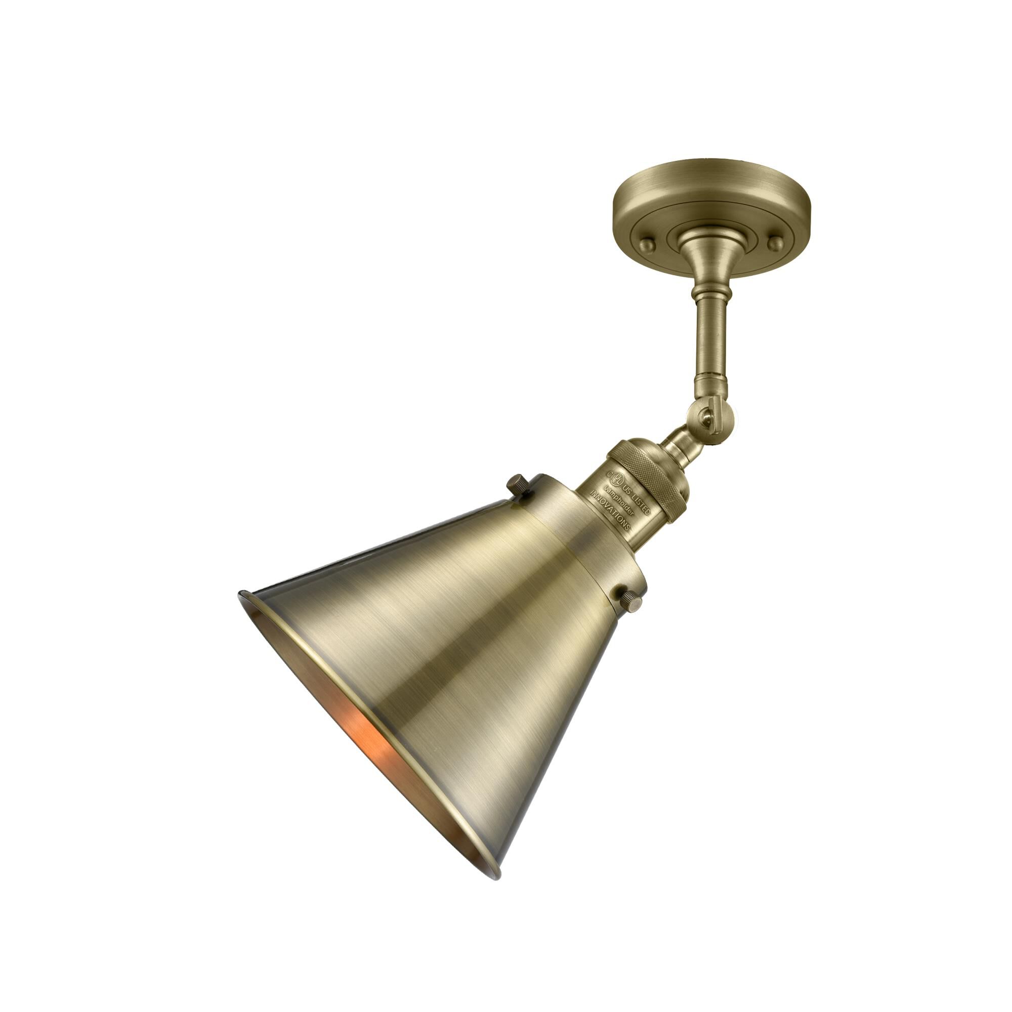 Shown in Antique Brass finish and Metal - Antique Brass - Cone shade