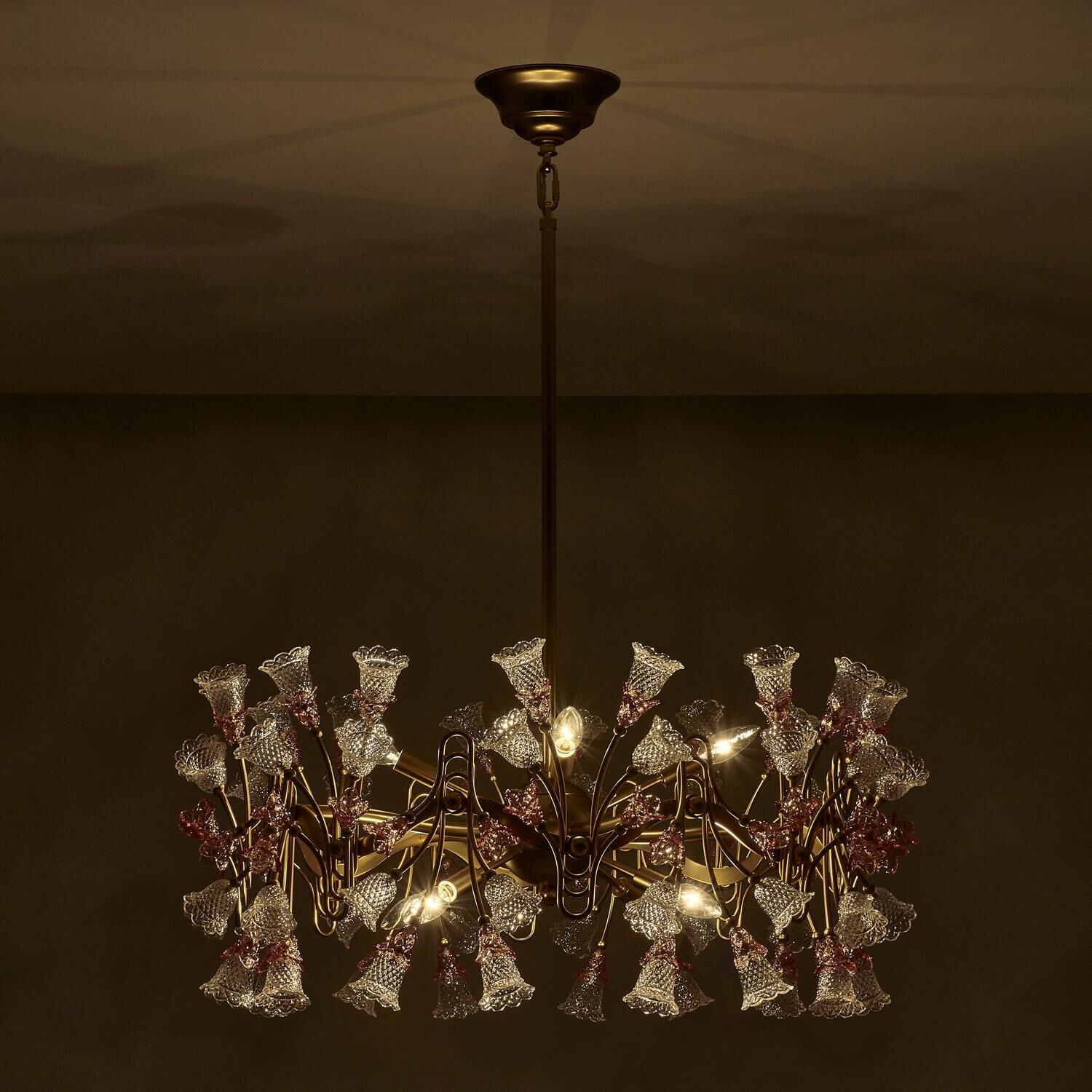 Shown in Antique Brass finish and Vintage Rose crystal