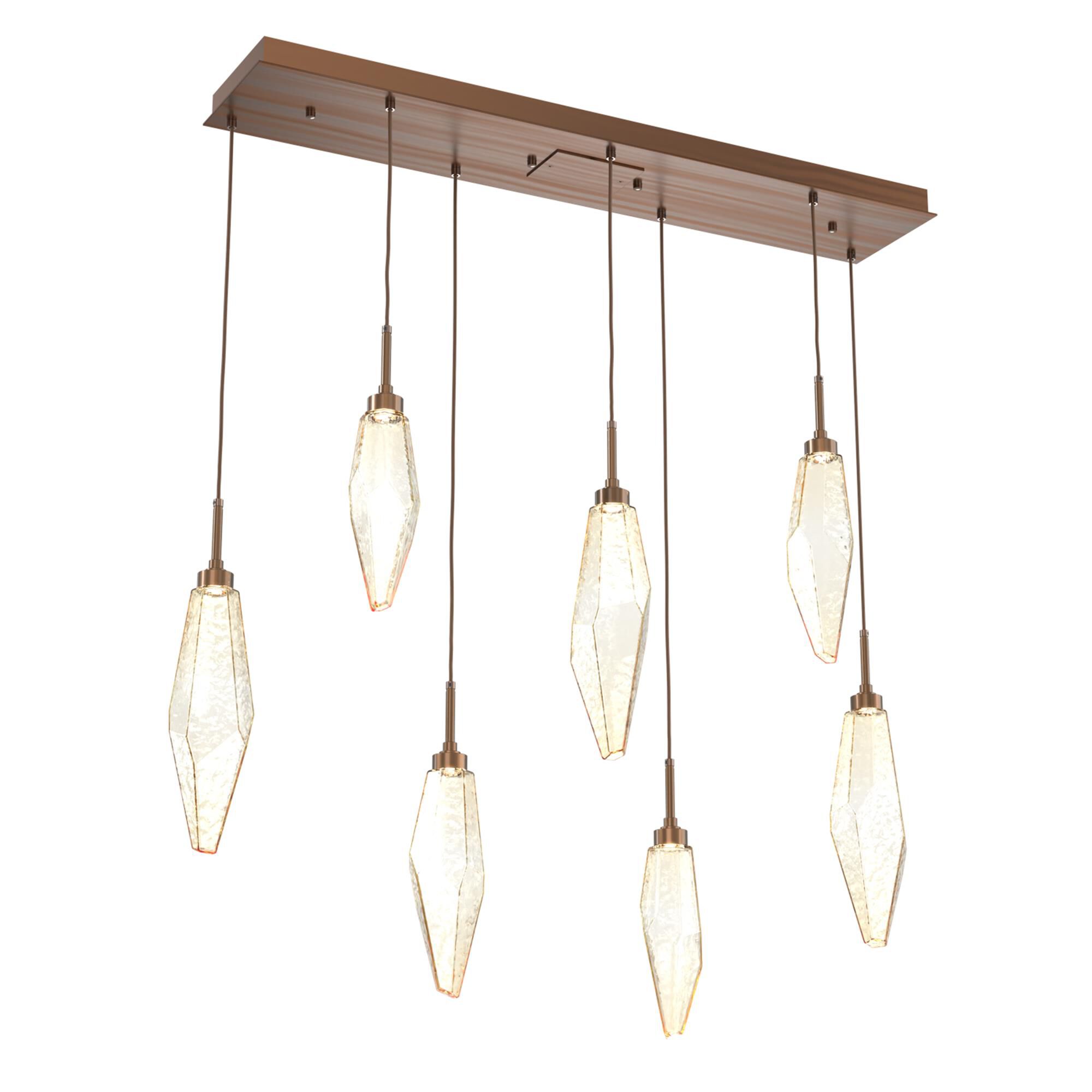 Shown in Burnished Brass finish and Chilled Amber glass