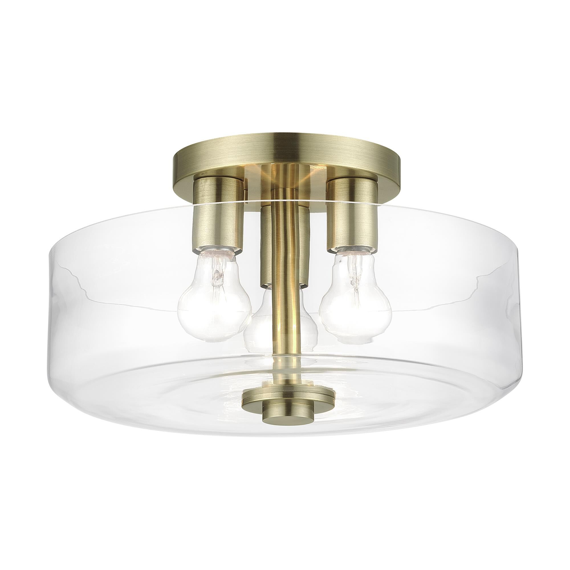 Shown in Antique Brass finish and Mouth Blown Clear glass