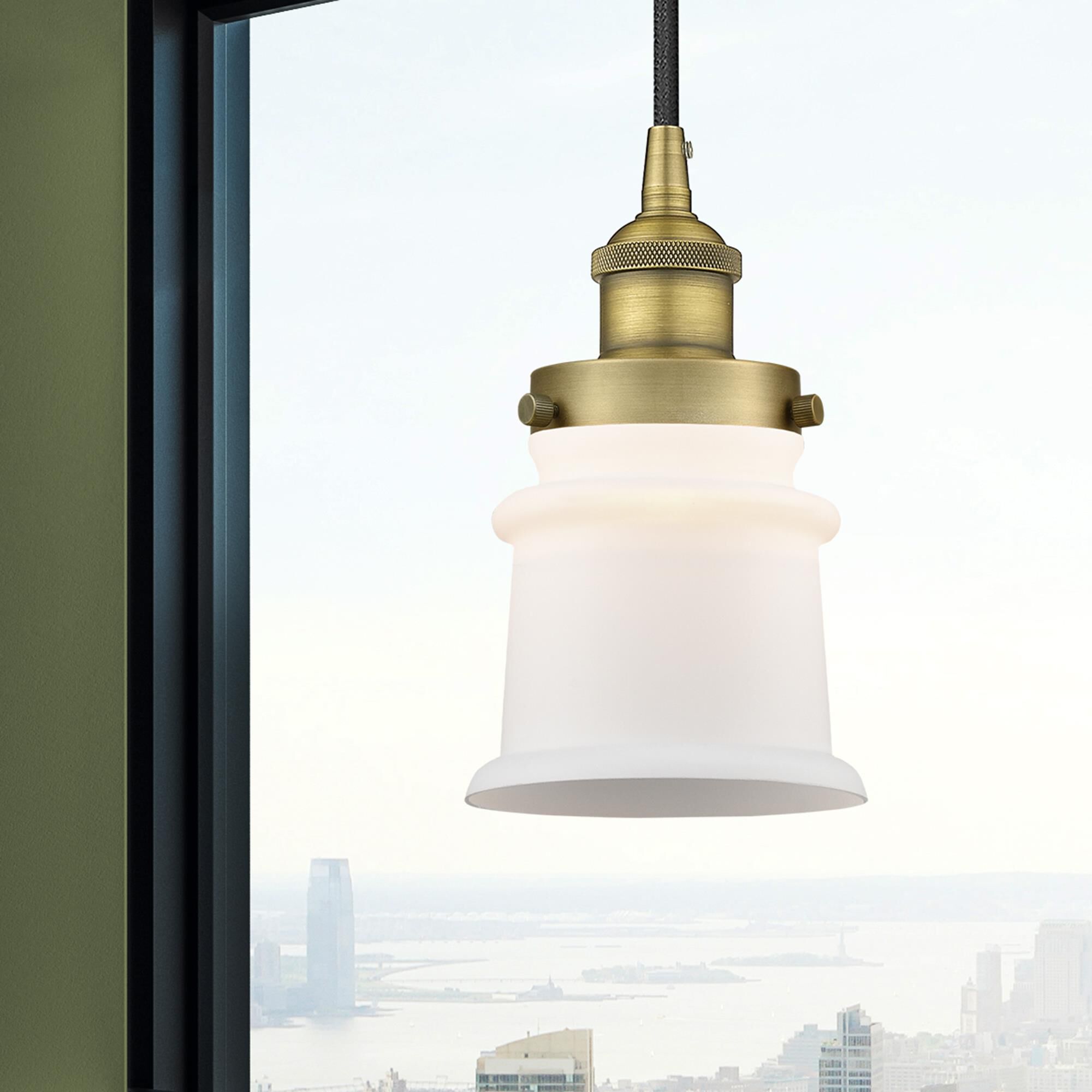 Shown in Brushed Brass finish and Matte White glass