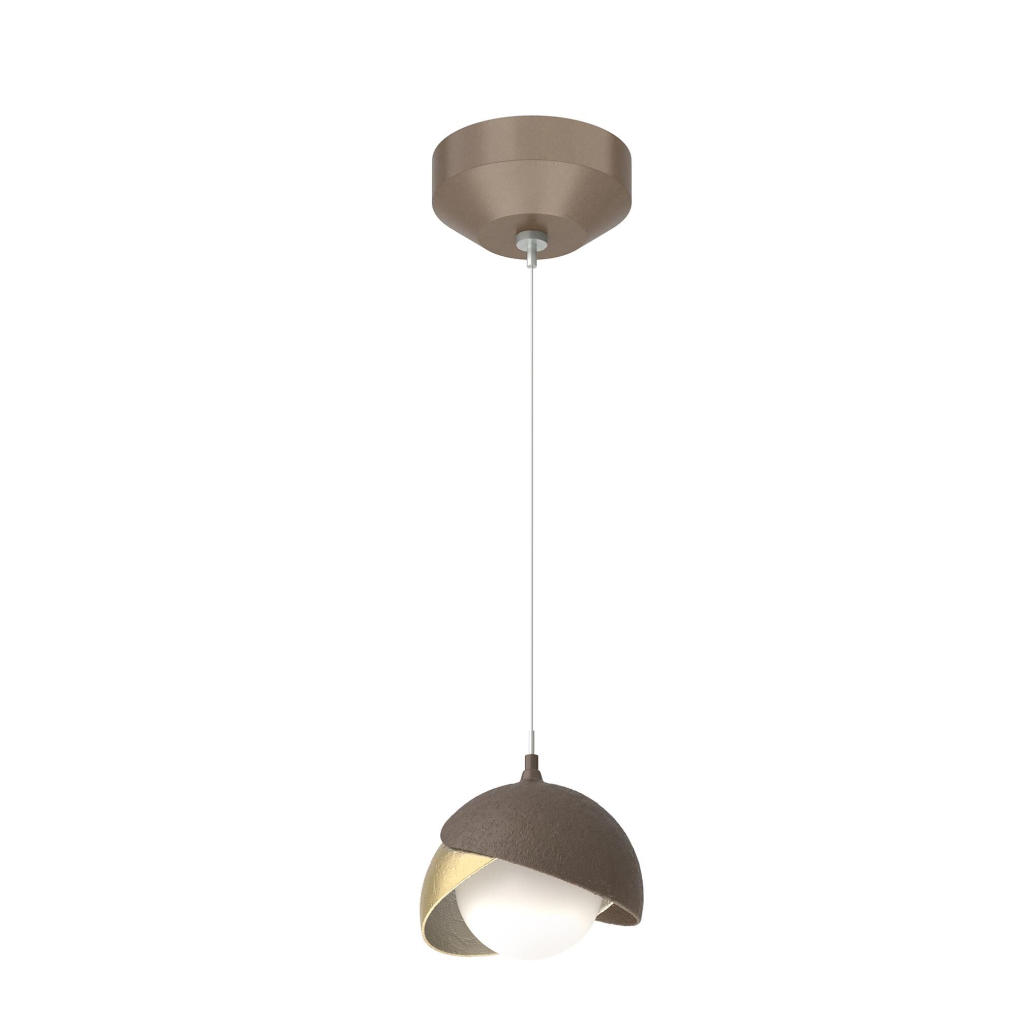 Shown in Bronze finish and Opal glass and Modern Brass  accent