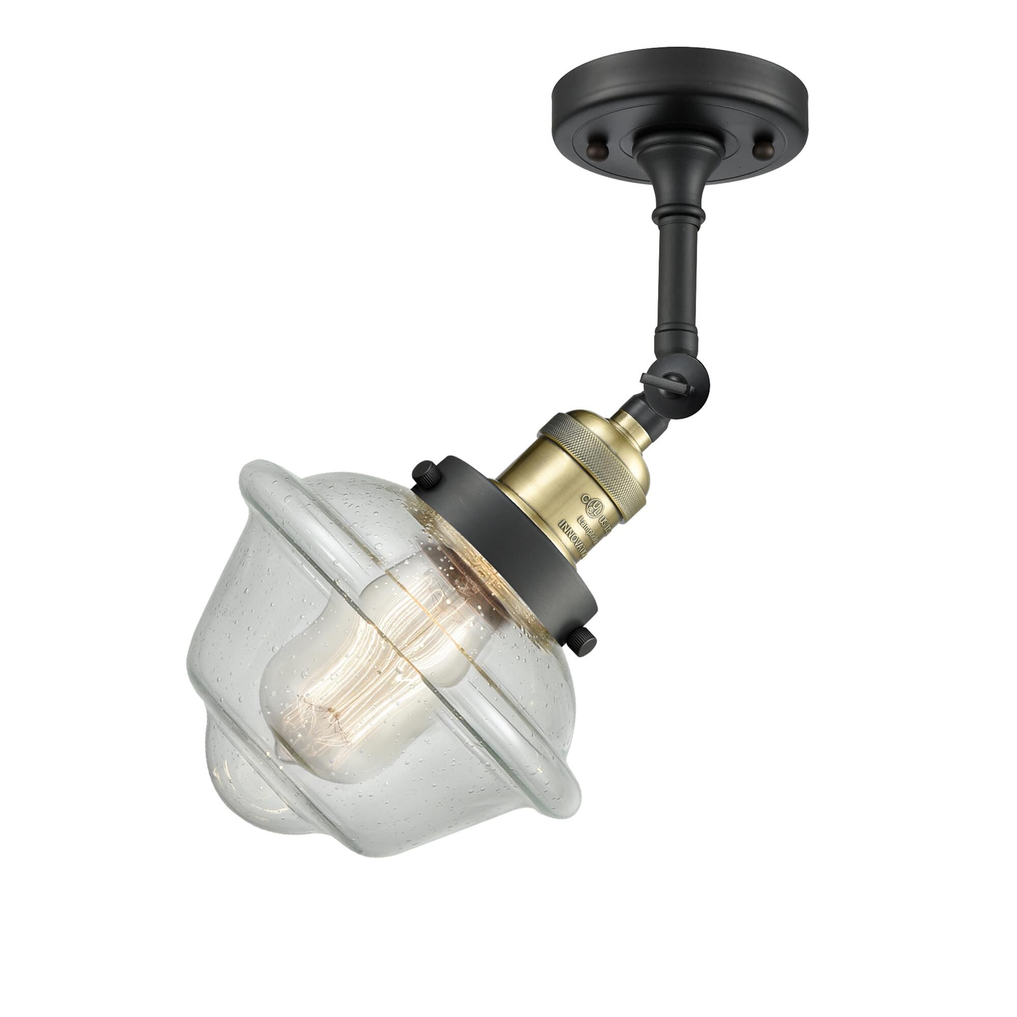 Shown in Black Antique Brass finish and Seedy glass