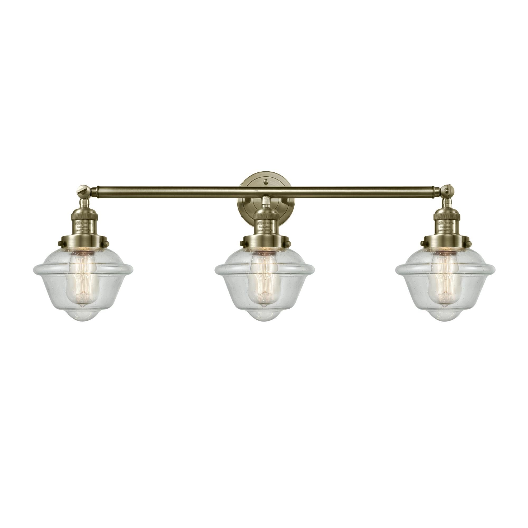 Shown in Antique Brass finish and Seedy Small Oxford glass