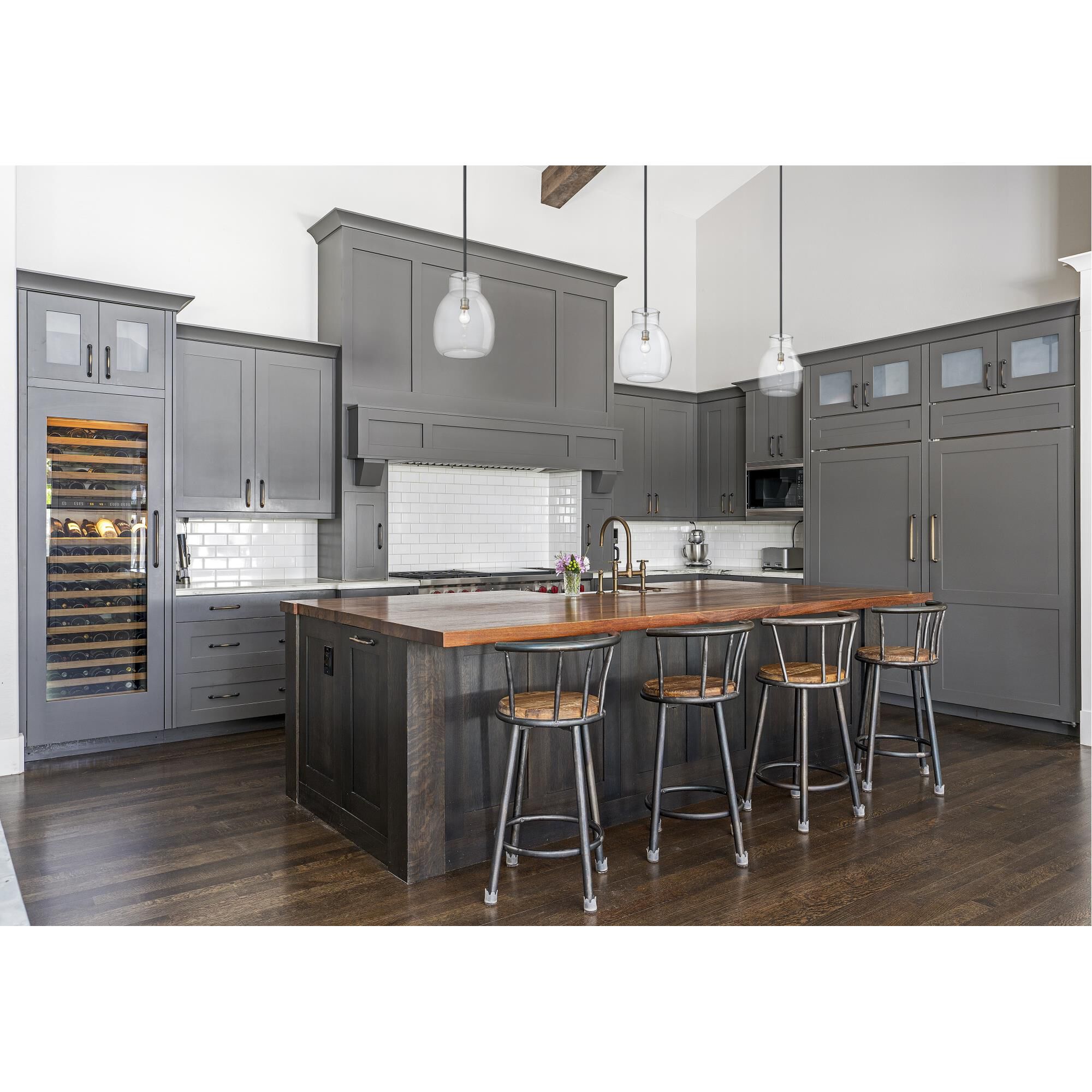 Shown in Matte Black + Brushed Nickel finish and Glass shade