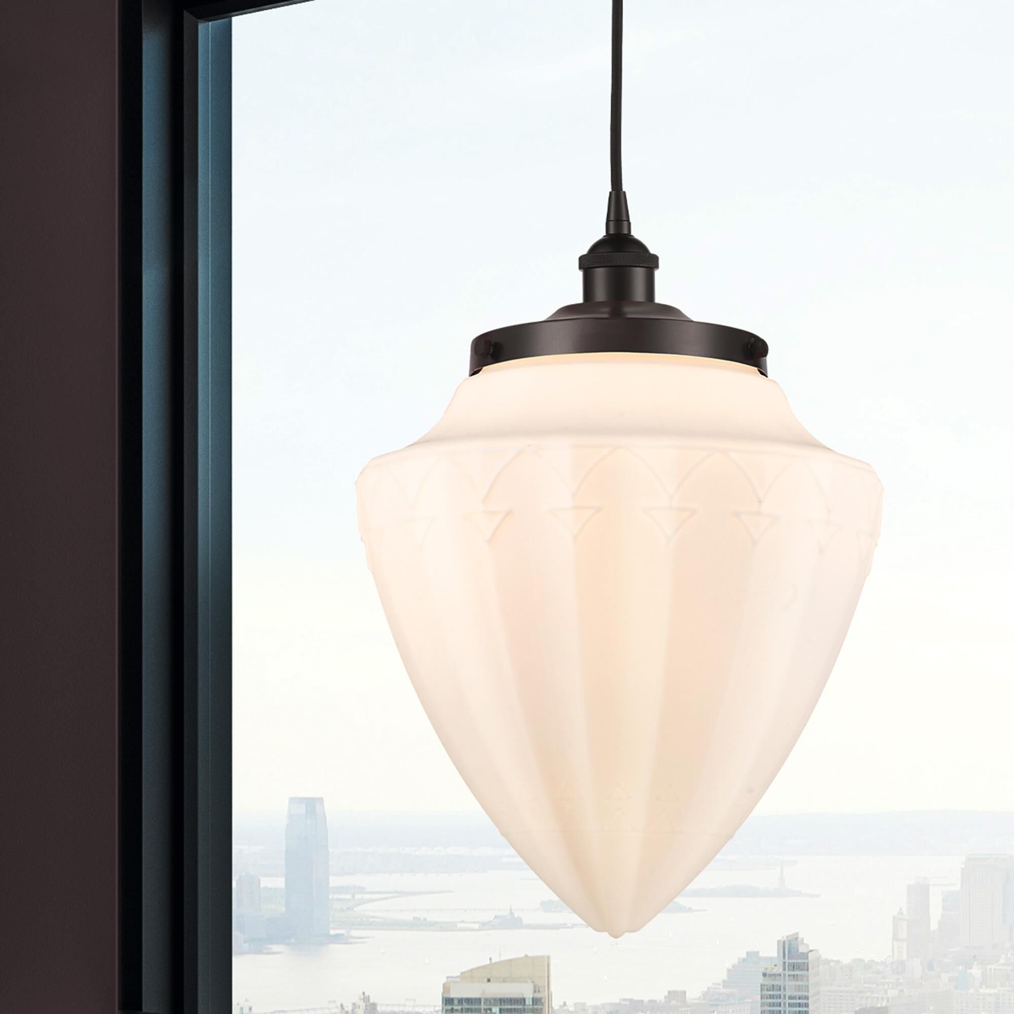 Shown in Oil Rubbed Bronze finish and Matte White glass