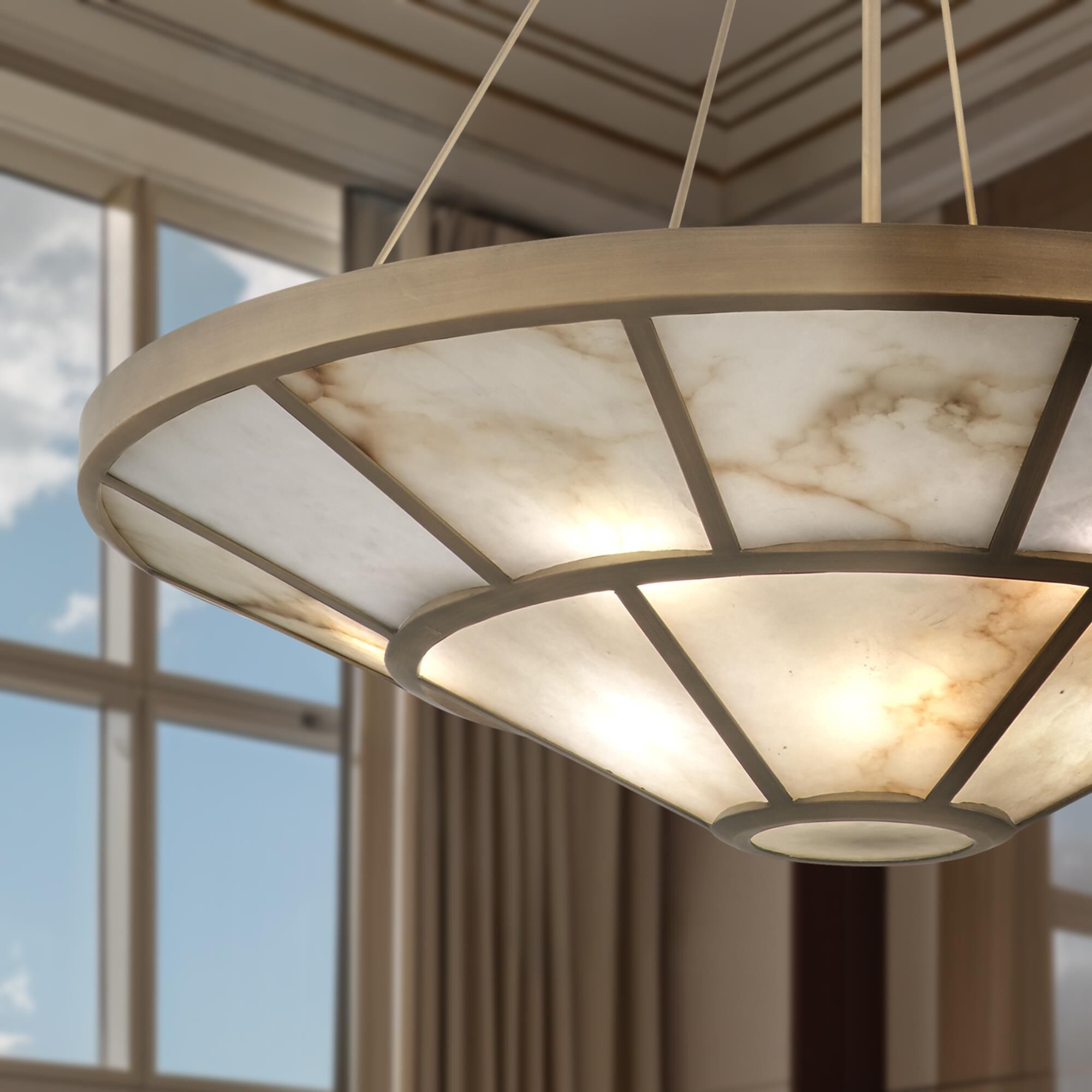 Shown in Ashen Gold finish and Alabaster White glass