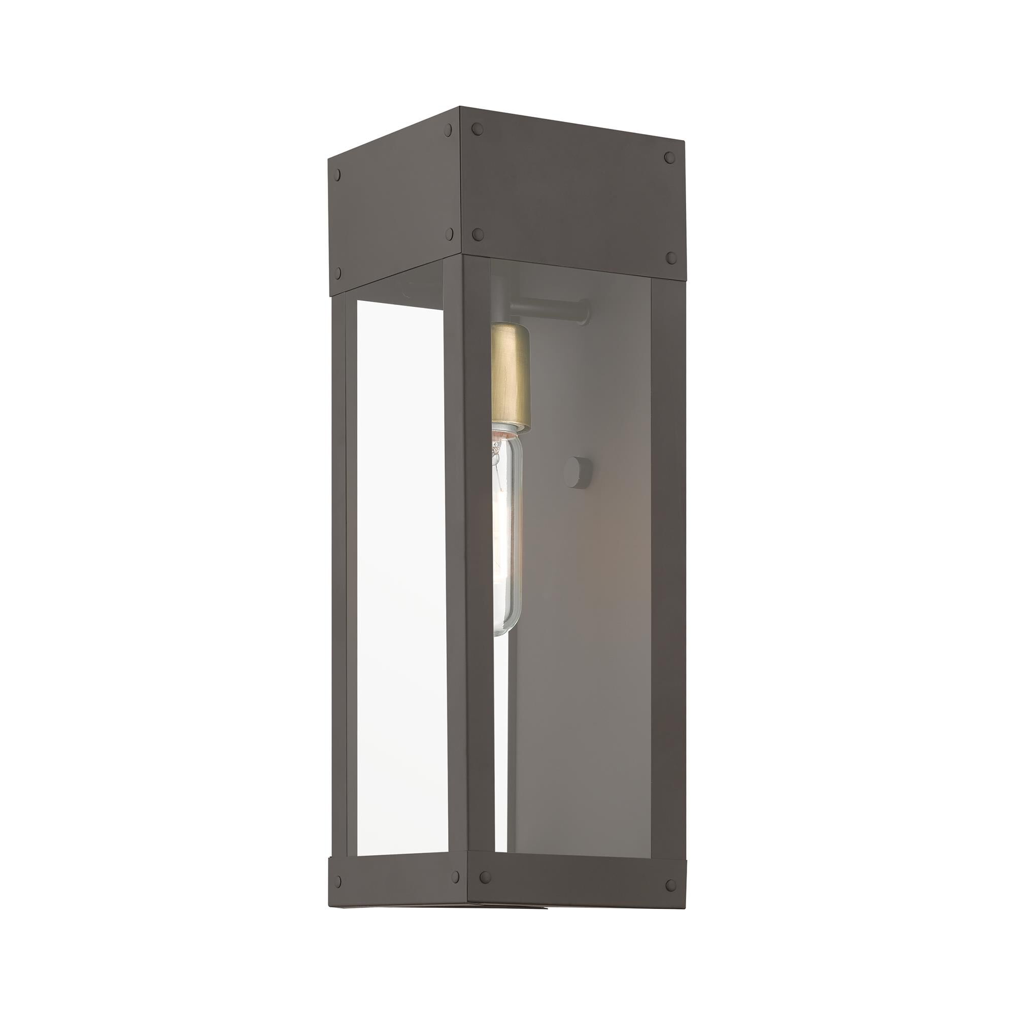 Shown in Bronze with Antique Brass Candle finish and Clear glass