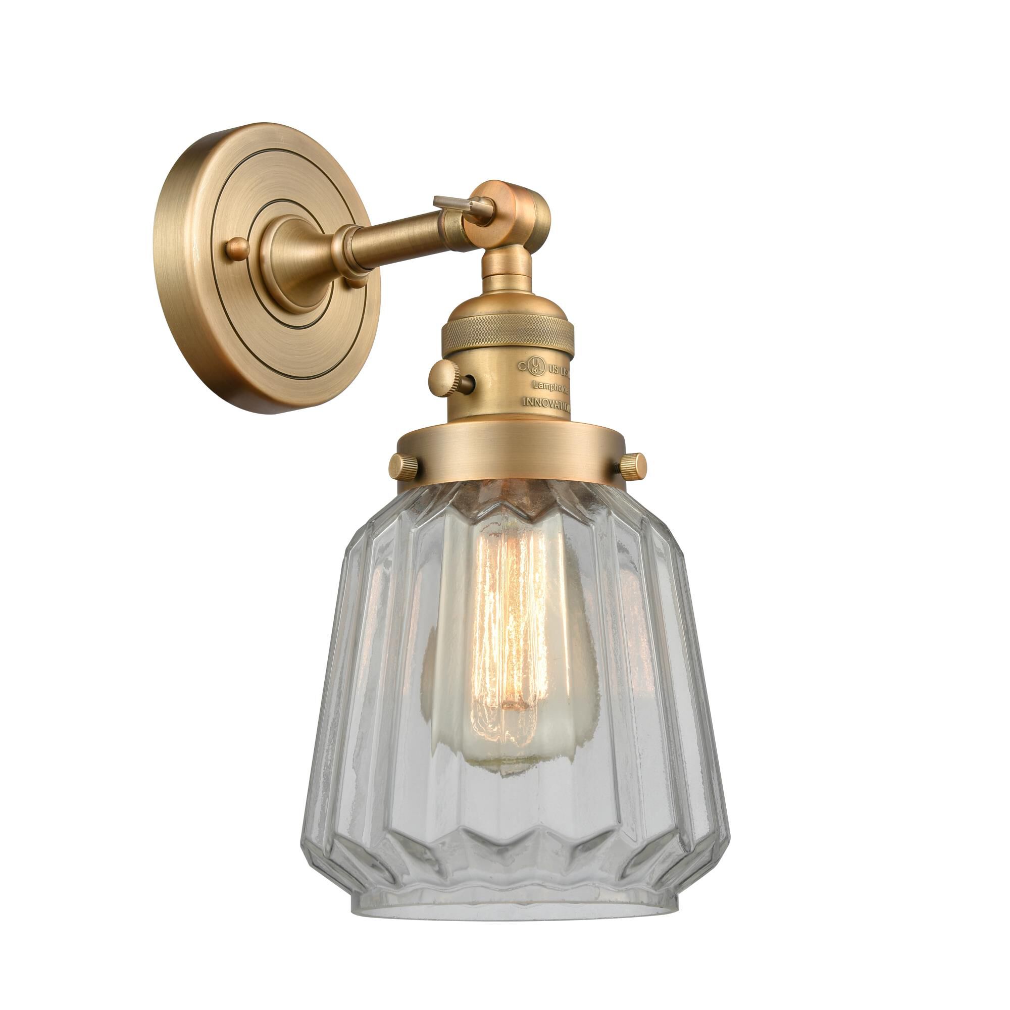 Shown in Brushed Brass finish and Clear glass