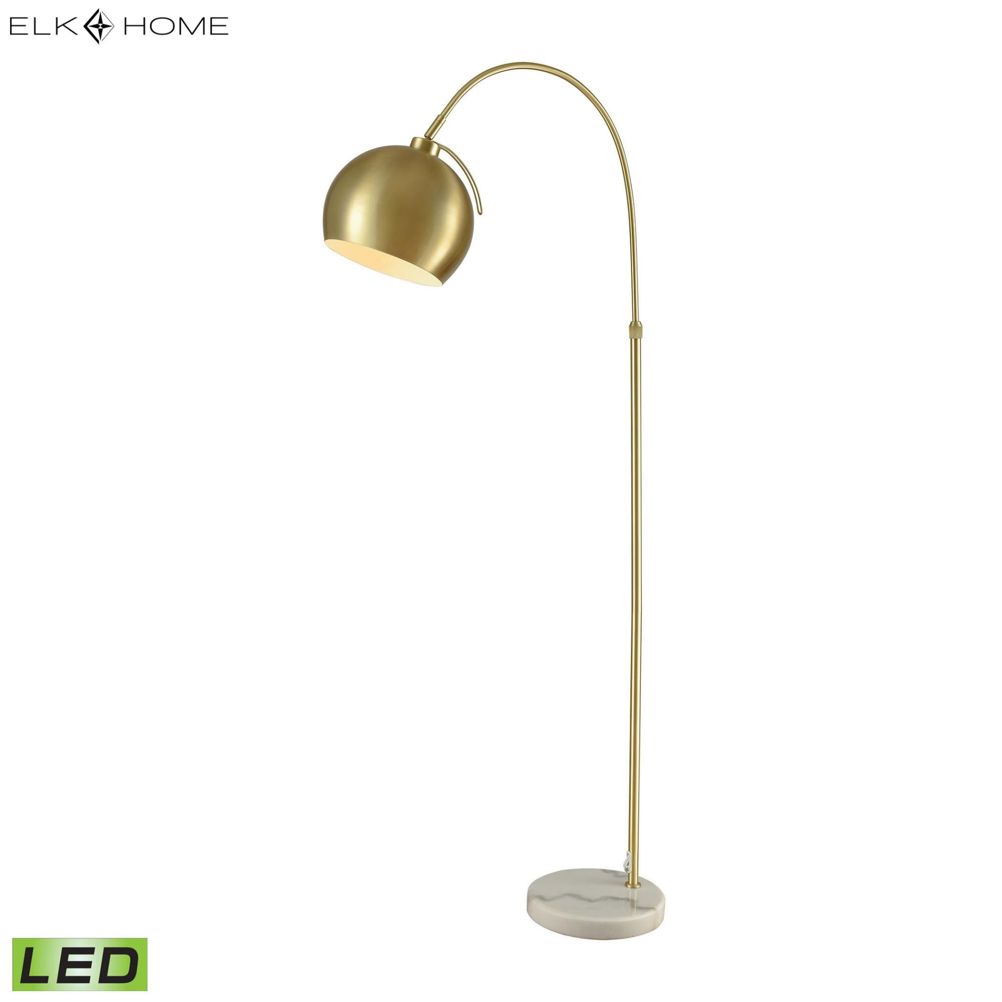Shown in Aged Brass finish and Metal shade