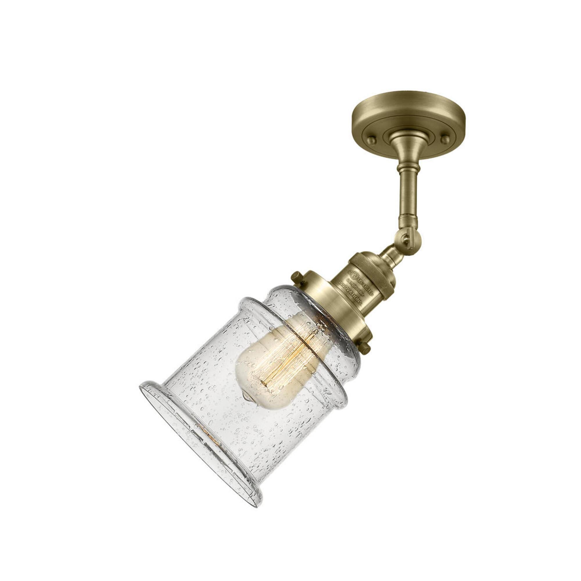 Shown in Antique Brass finish and Seedy glass and No Accent accent