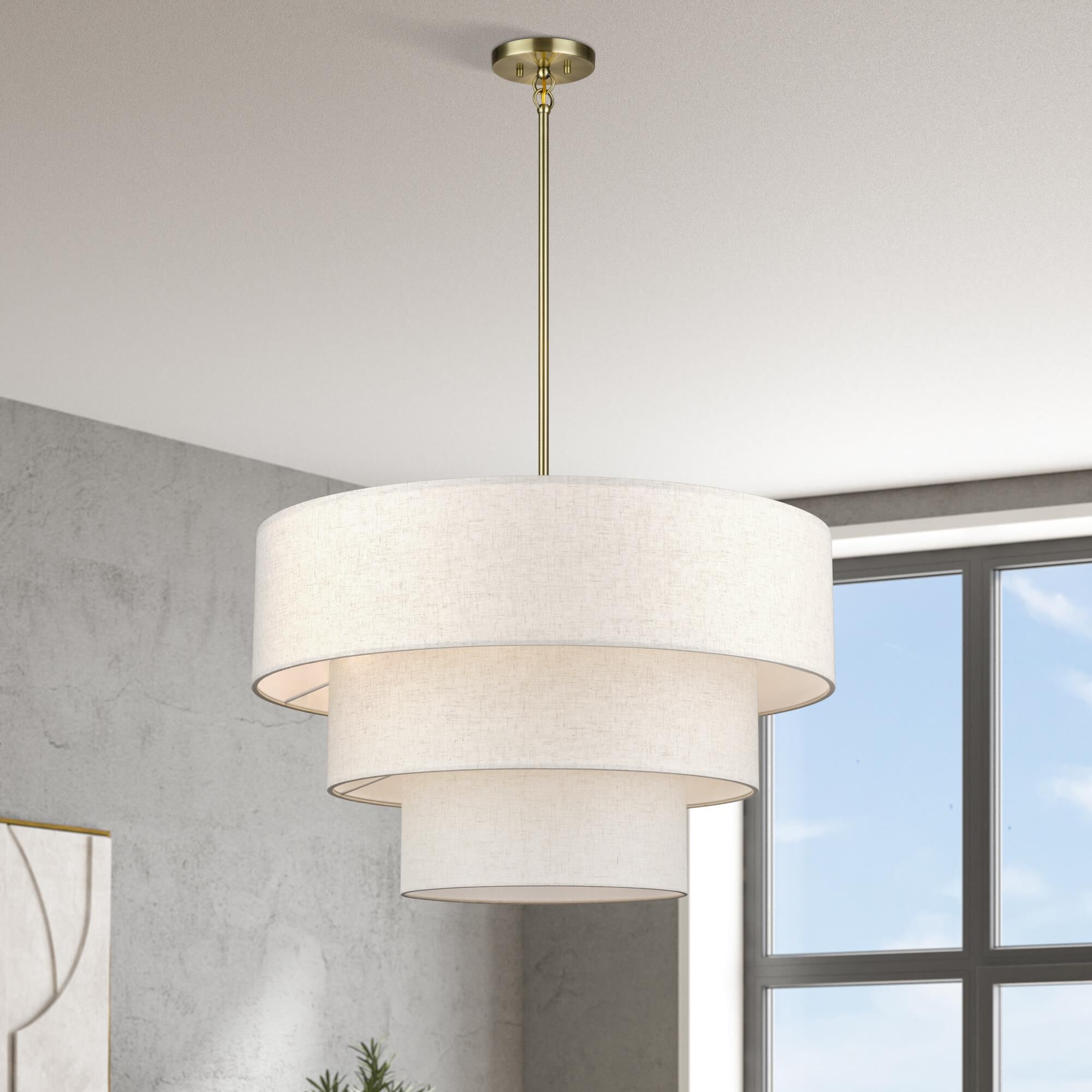 Shown in Antique Brass finish and Hand Crafted Oatmeal Color Fabric with White Color Inside shade