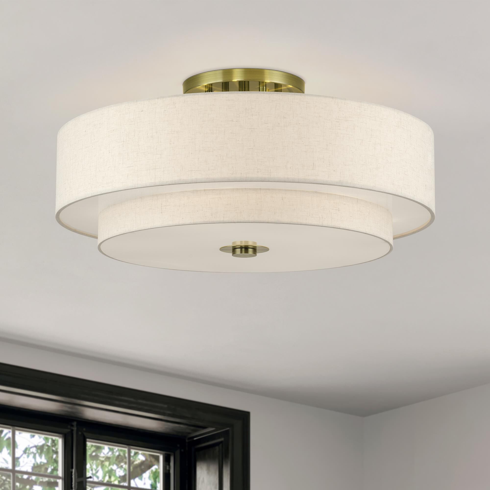 Shown in Antique Brass finish and Hand Crafted Oatmeal Color Fabric with White Color Inside shade