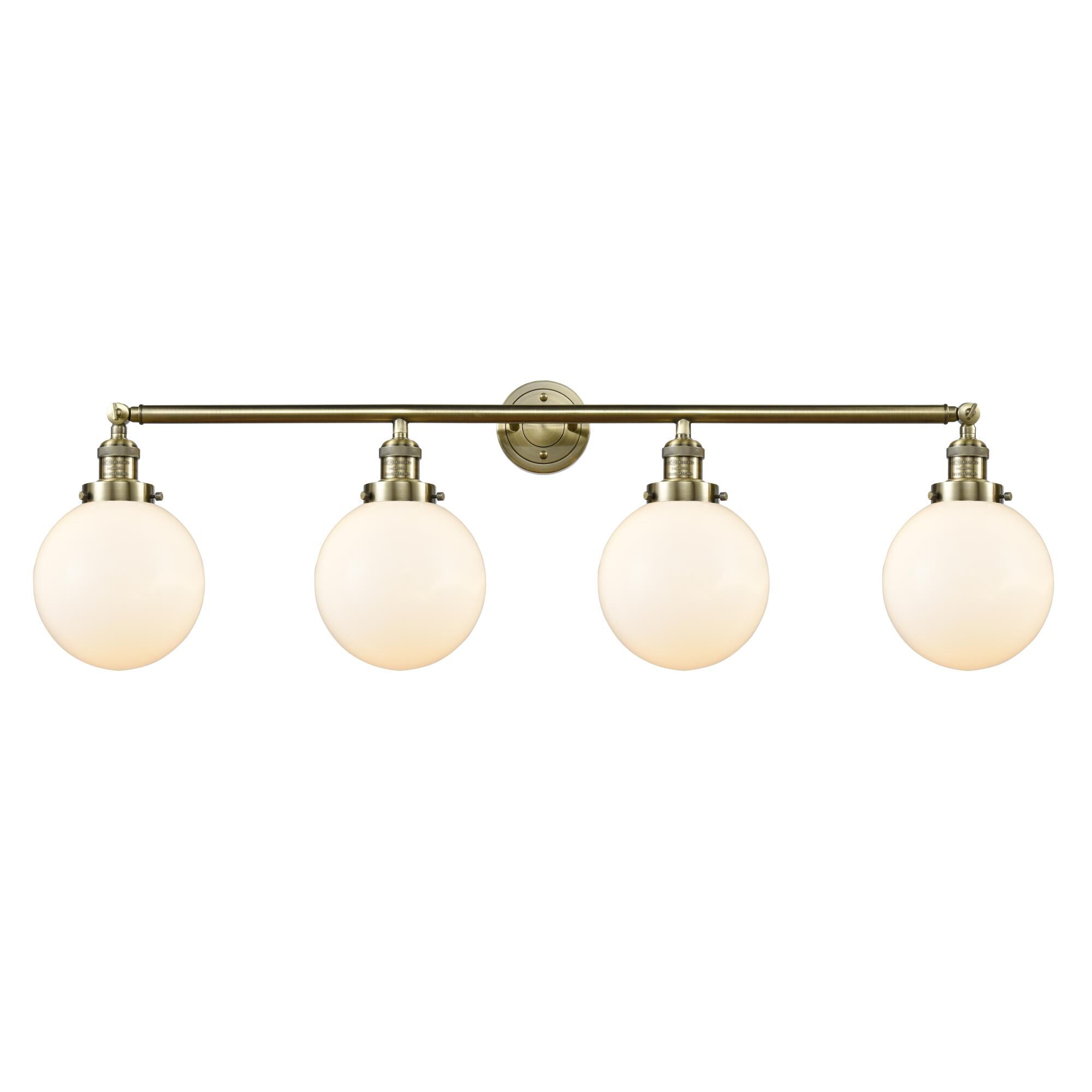 Shown in Antique Brass finish and Matte White Cased Beacon glass