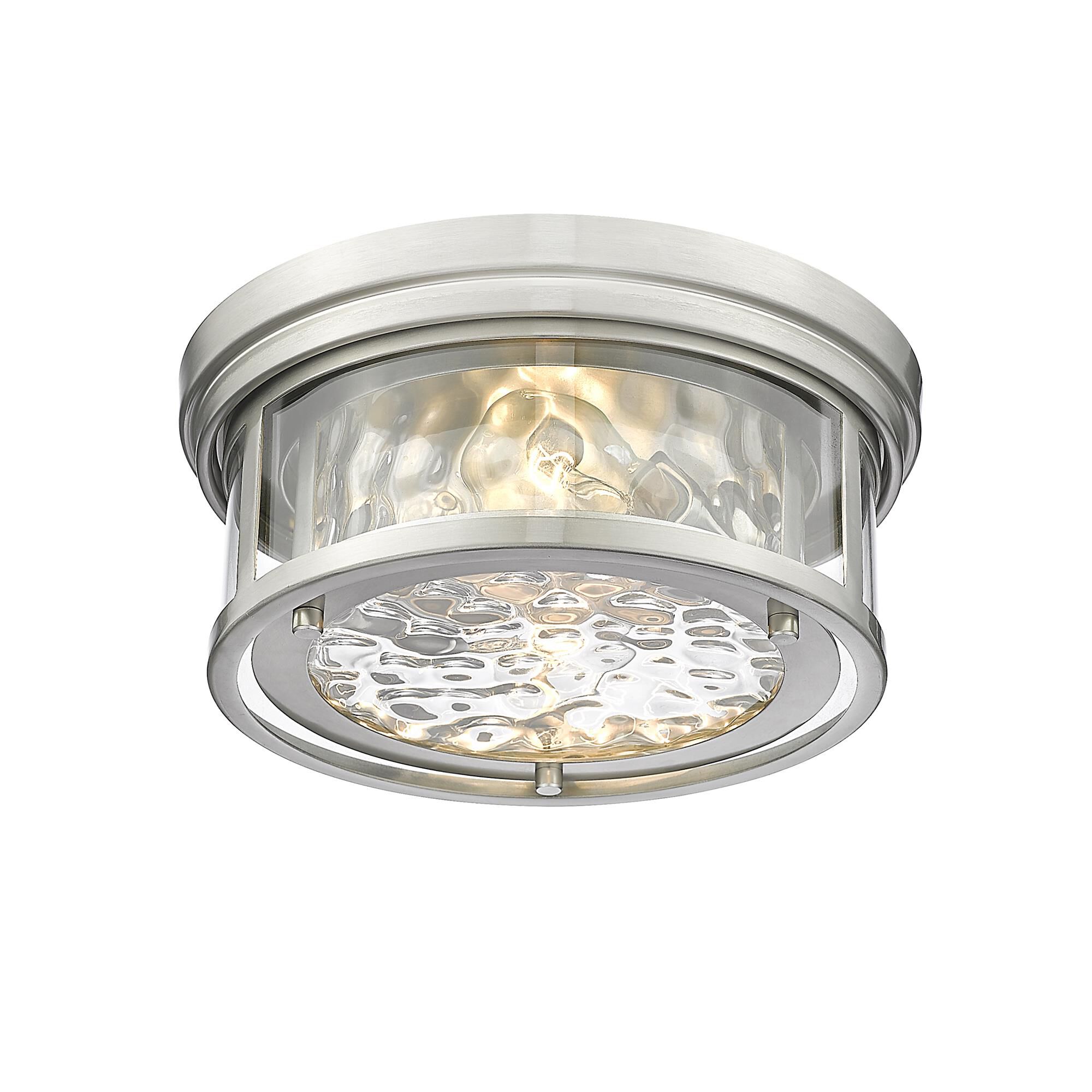 Shown in Brushed Nickel finish and Glass shade