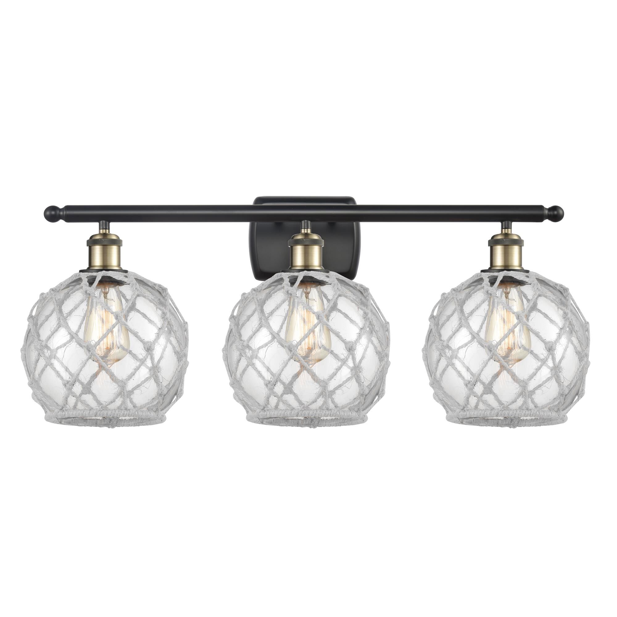 Shown in Black Antique Brass finish and Sphere glass and Glass And Rope shade and Polished Chrome accent
