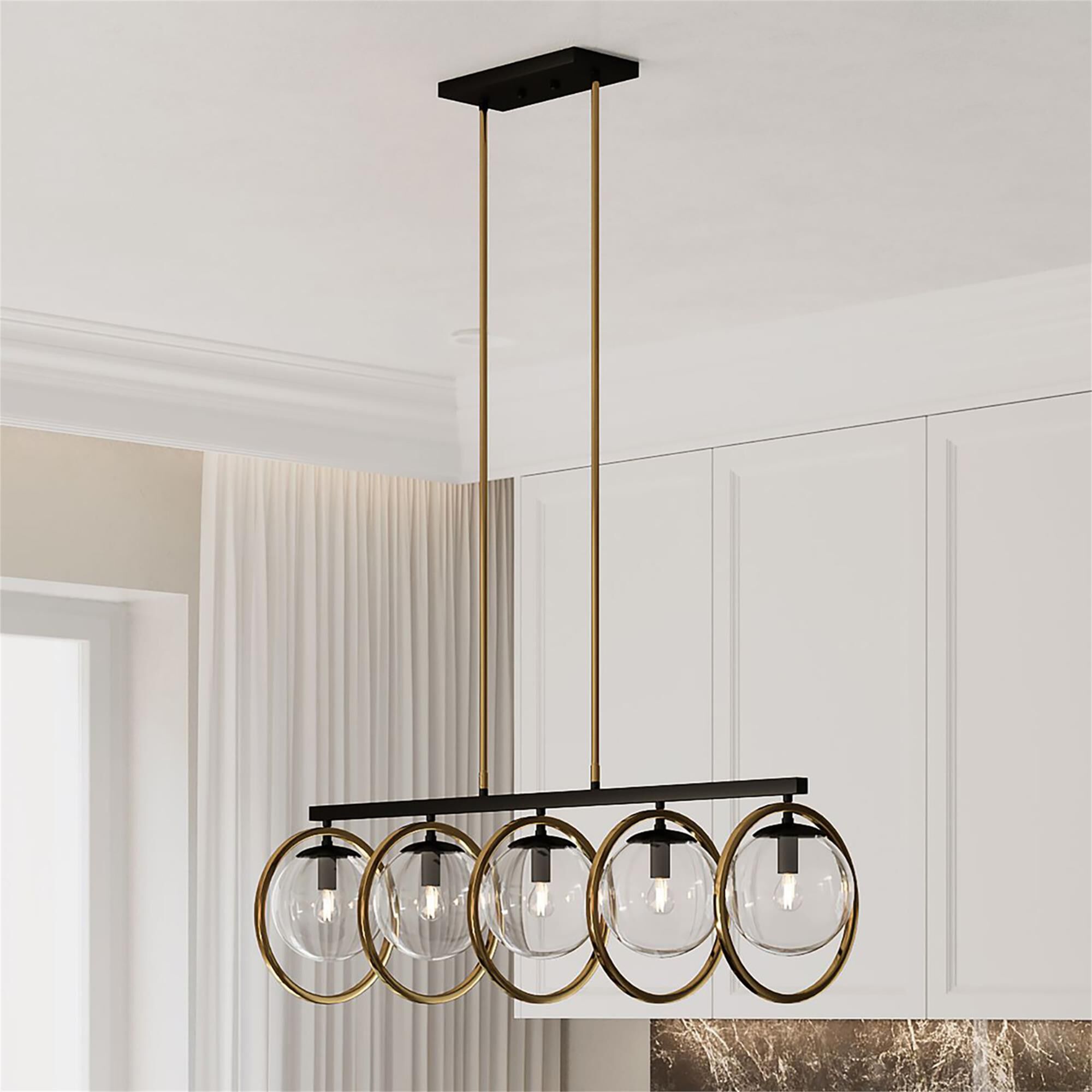 Shown in Black and Vintage Brass finish and Clear glass