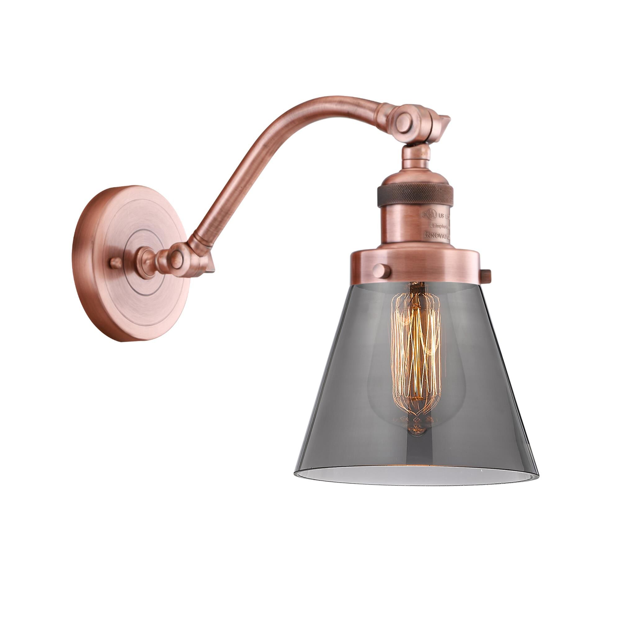 Shown in Antique Copper finish and Plated Smoke Small Cone glass