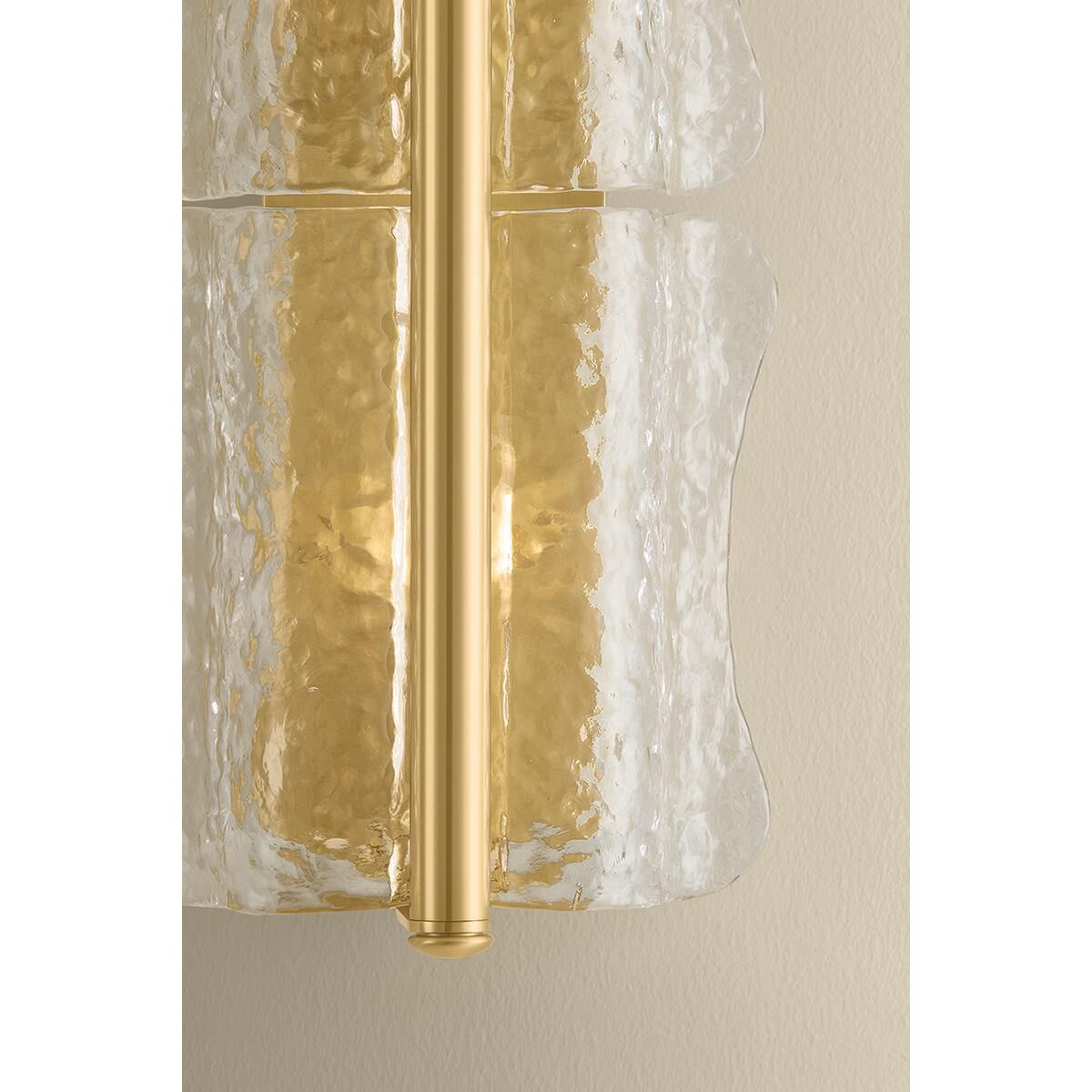 Shown in Aged Brass finish and Clear Optic glass
