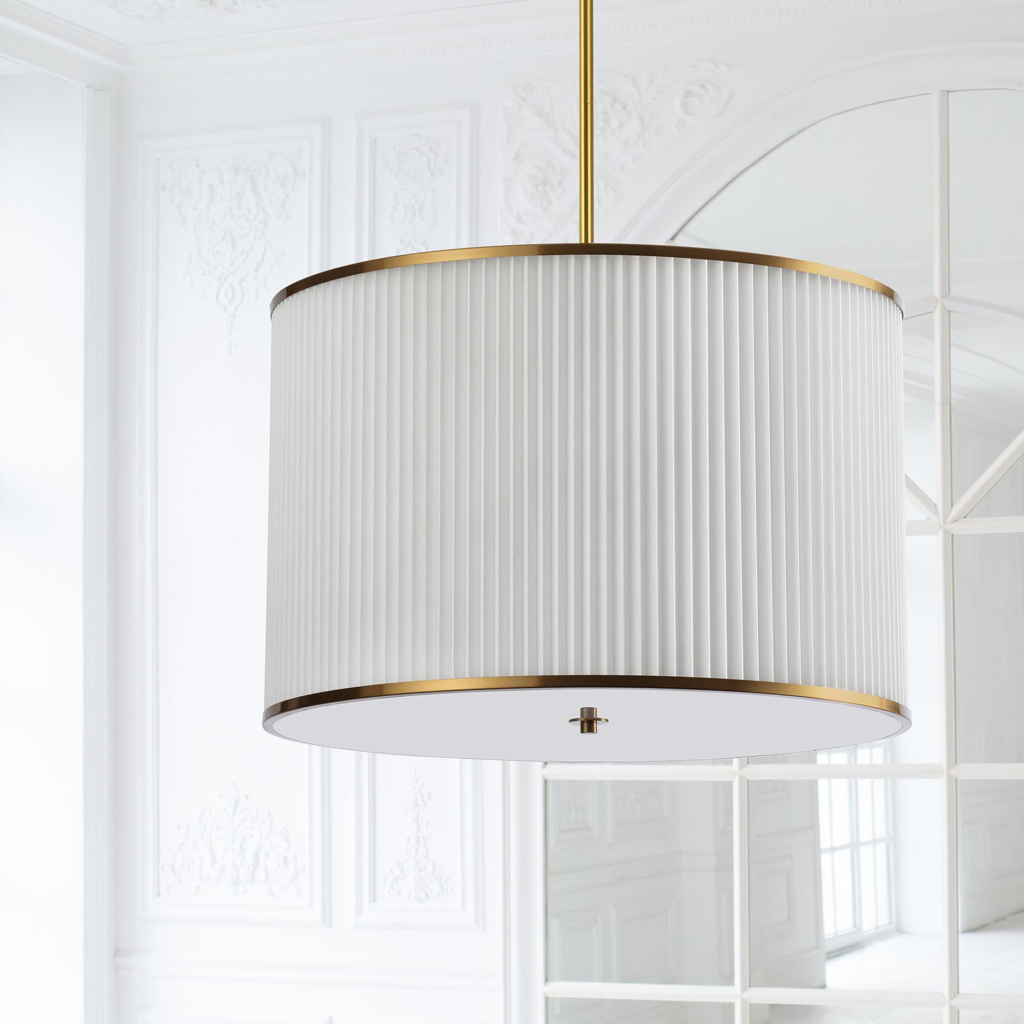 Shown in White and Aged Brass finish and White Fabric Drum shade